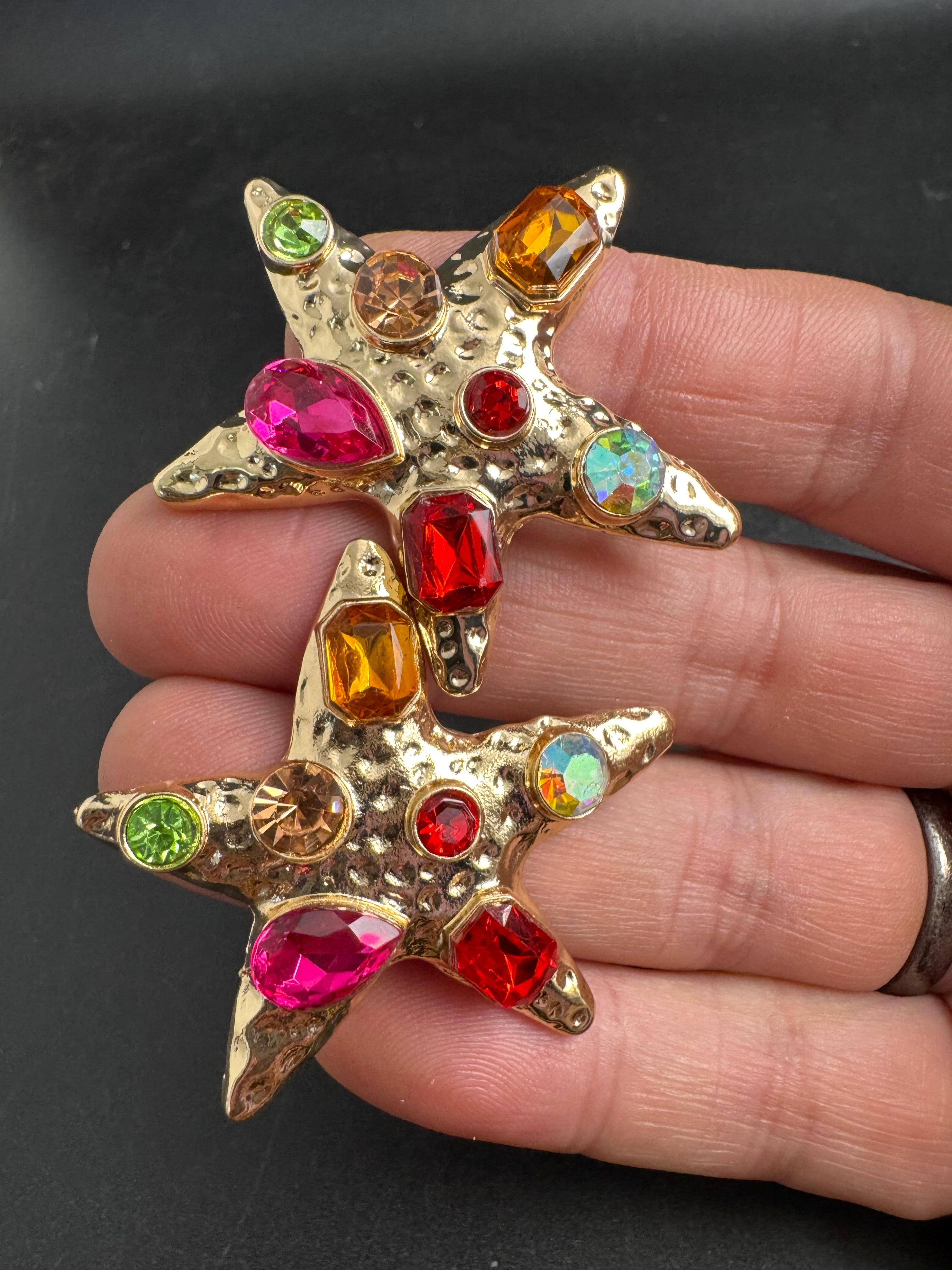 Oversized gold starfish earrings set with rainbow crystals, nautical jewellery