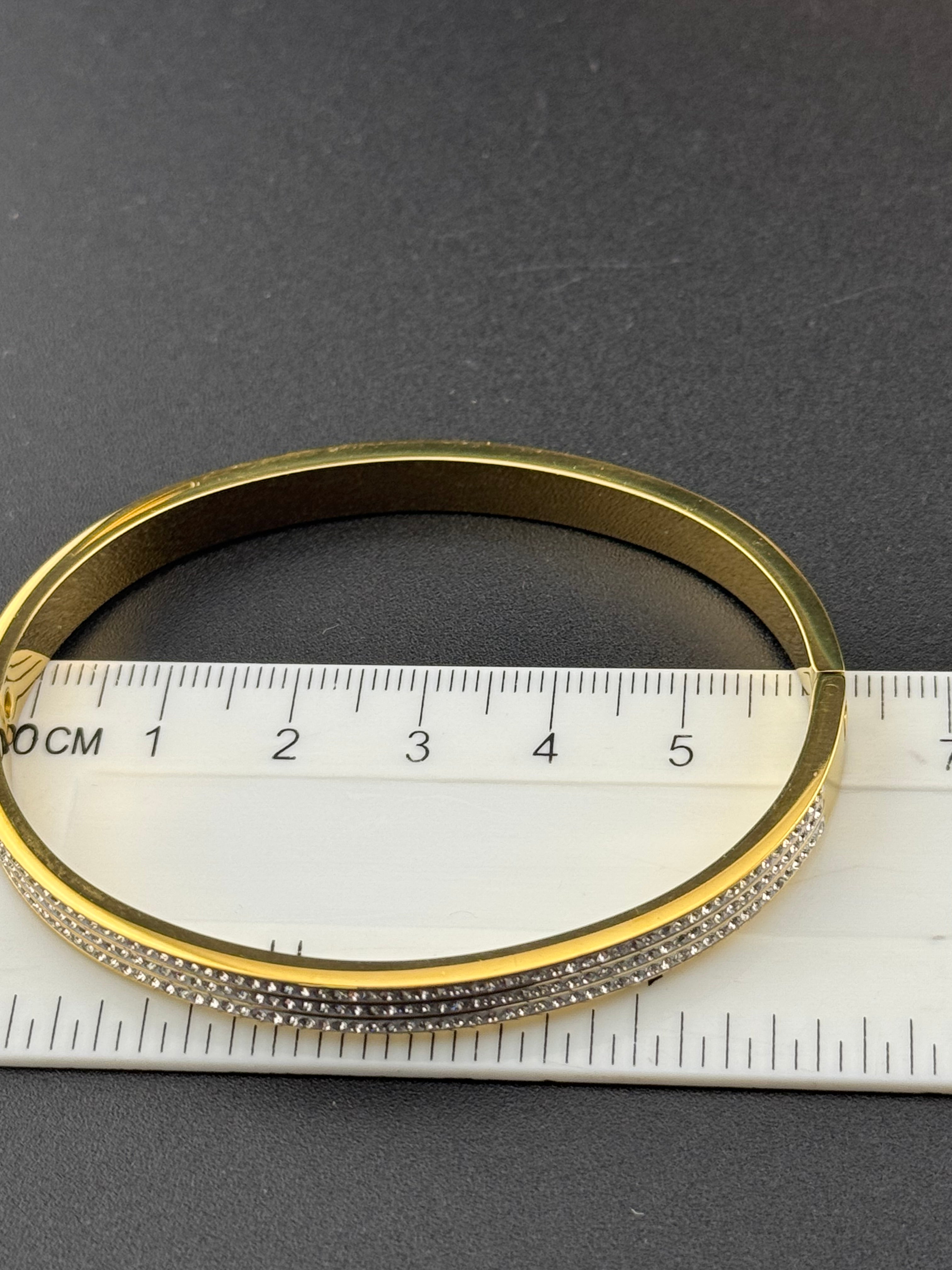 Gold plated high end triple channel set wide clear CZ Crystal hinged clamper bangle bracelet