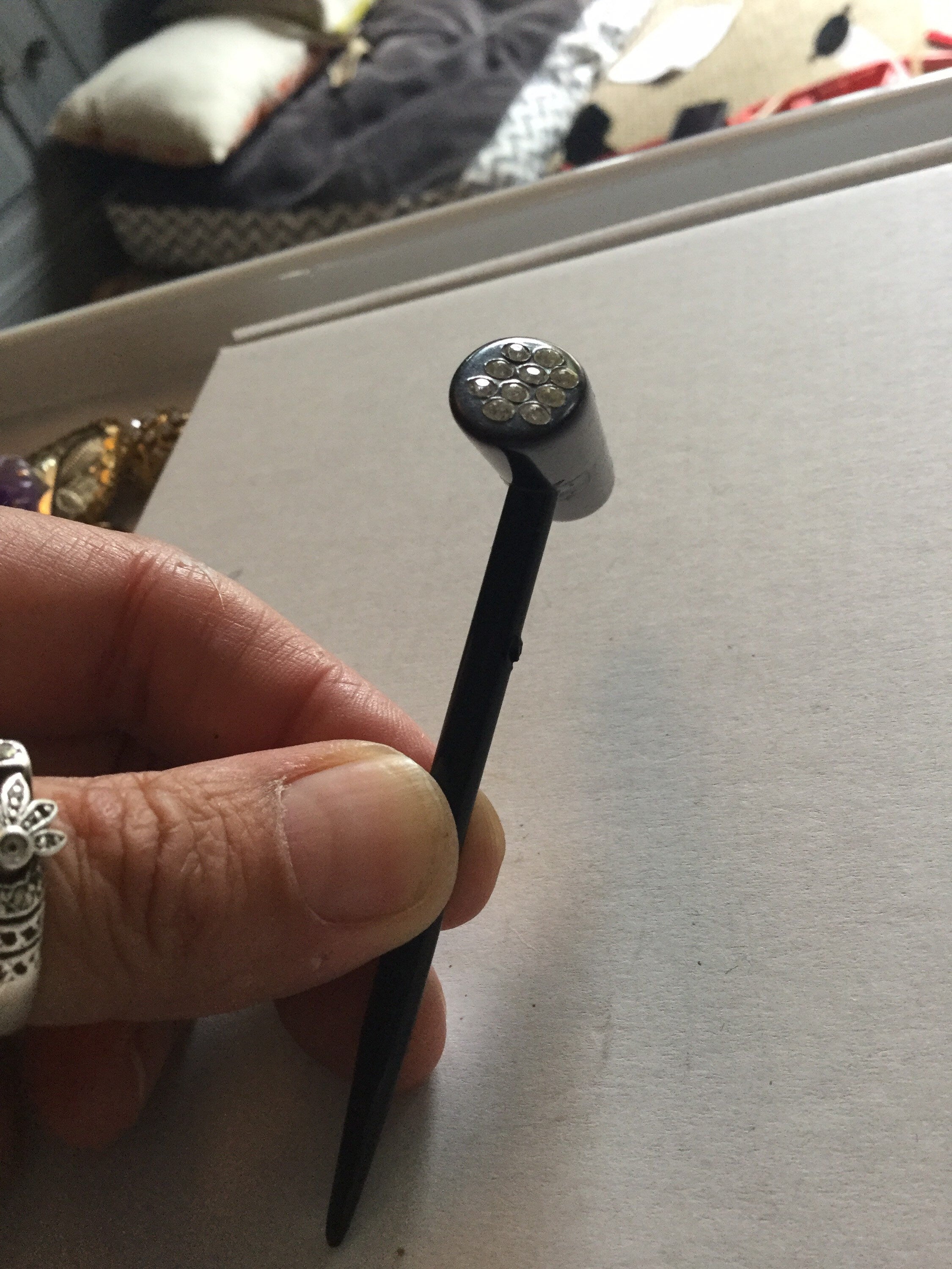 True Art Deco hat flash pin diamante set black bakelite