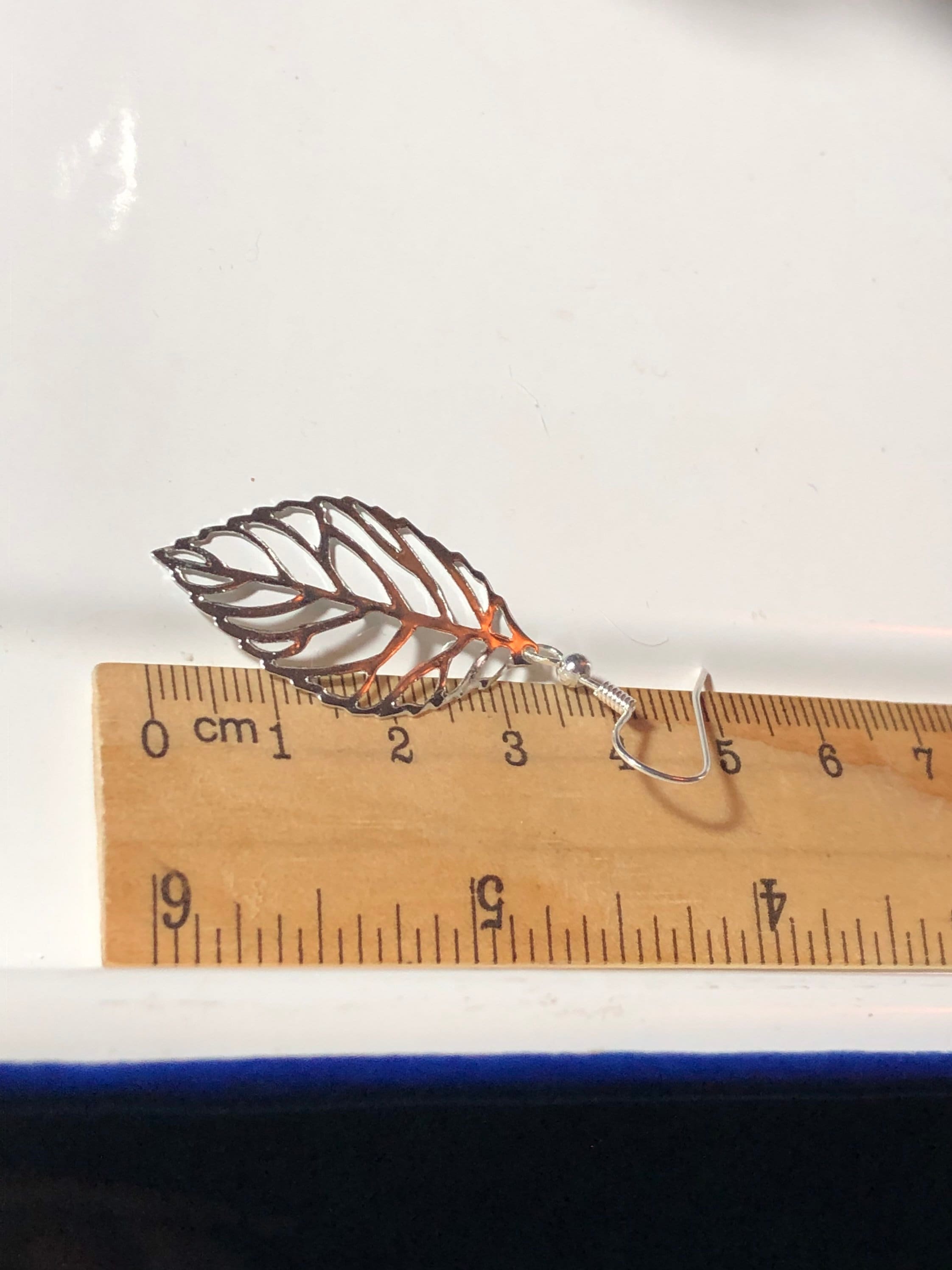 openwork leaf long drop earrings pierced ears silver tone nature inspired