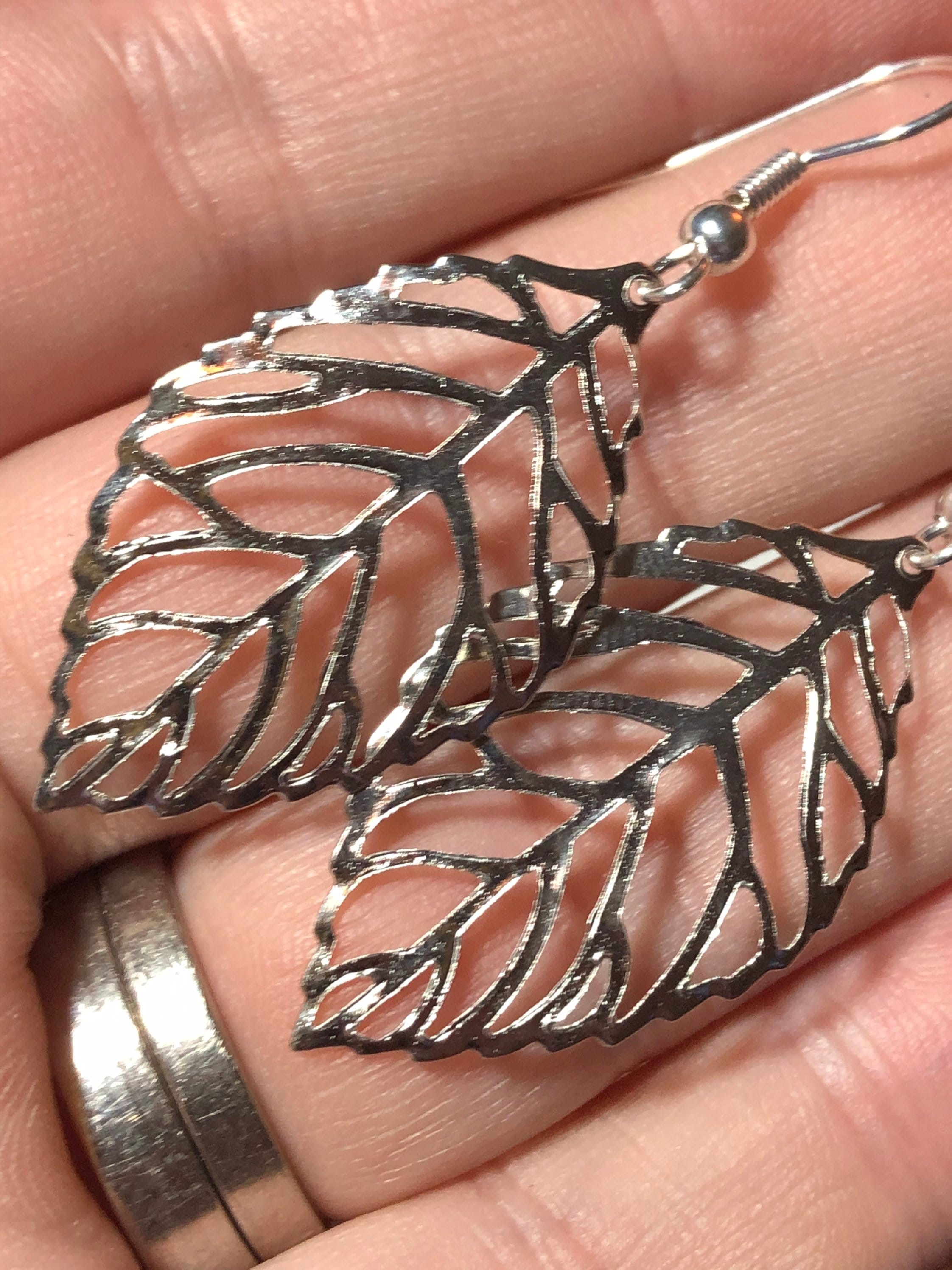 openwork leaf long drop earrings pierced ears silver tone nature inspired