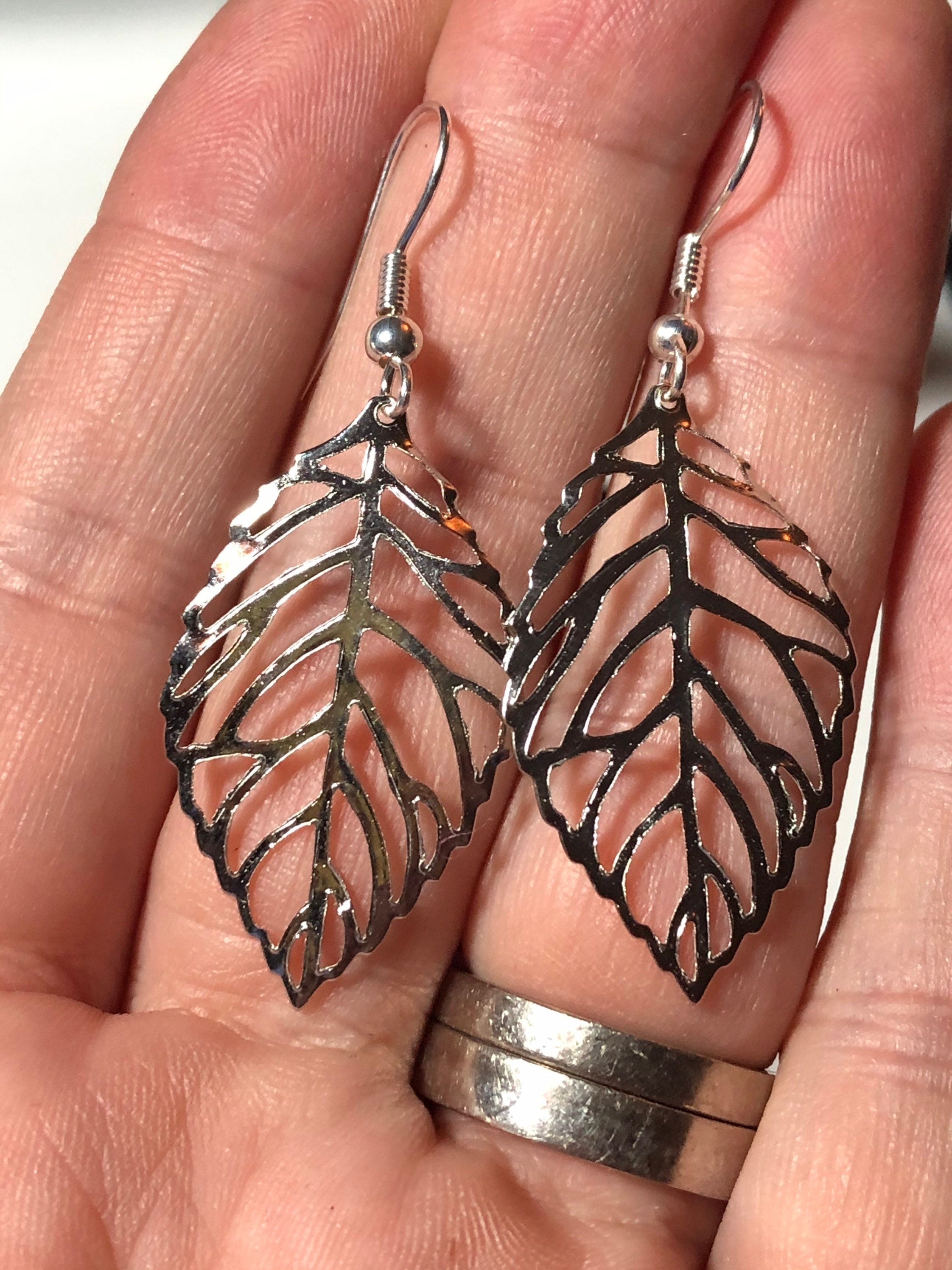 openwork leaf long drop earrings pierced ears silver tone nature inspired