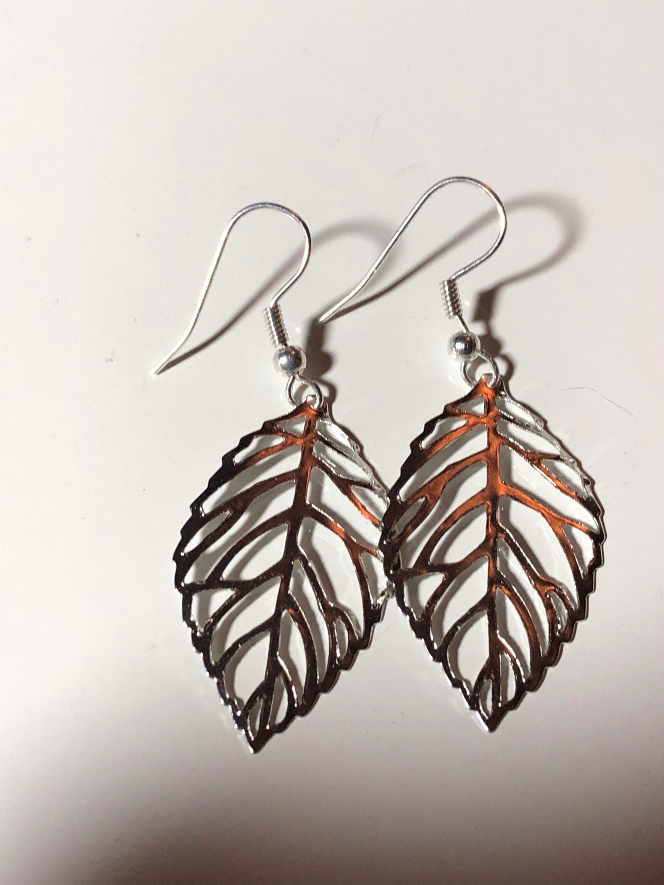 openwork leaf long drop earrings pierced ears silver tone nature inspired