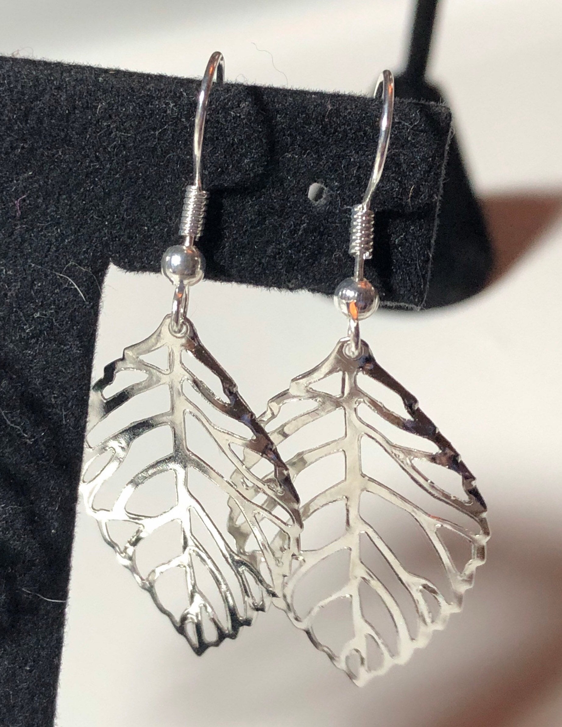 openwork leaf long drop earrings pierced ears silver tone nature inspired