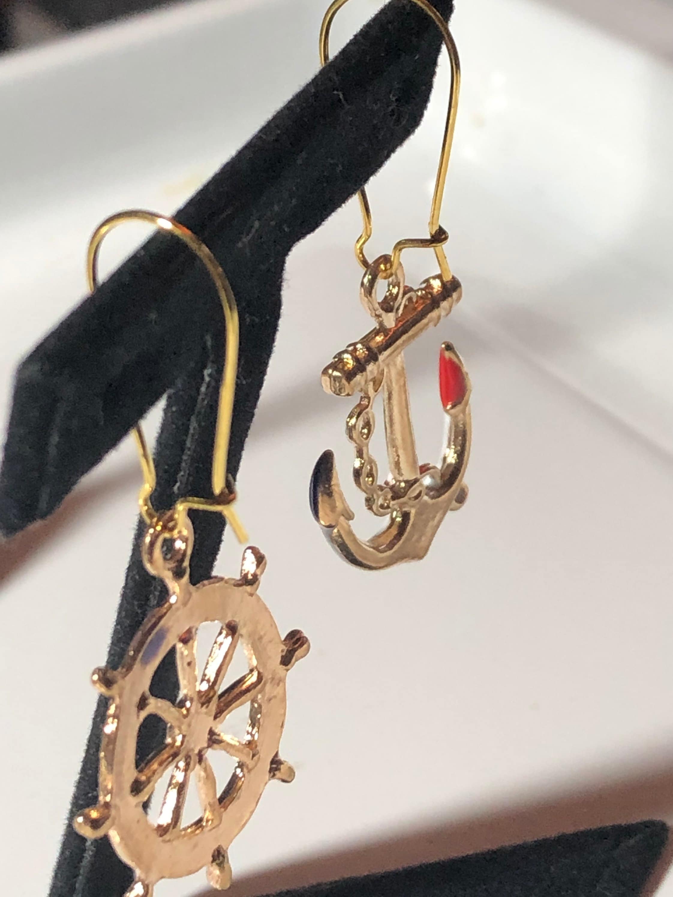 Nautical gold tone white enamel anchor and ships wheel small drop earrings