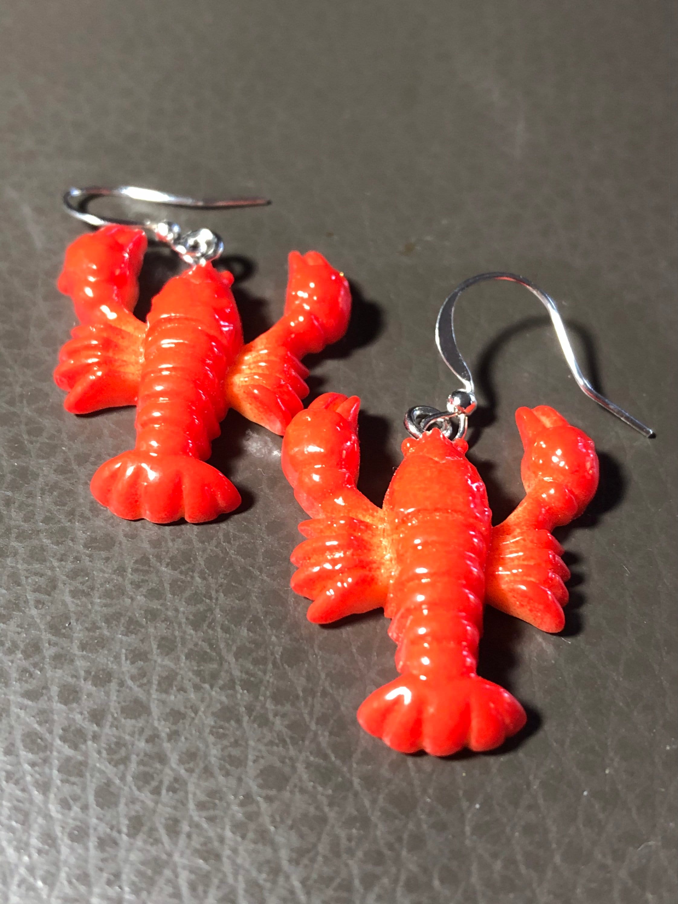 Orange plastic nautical lobster dangly earrings pierced ears