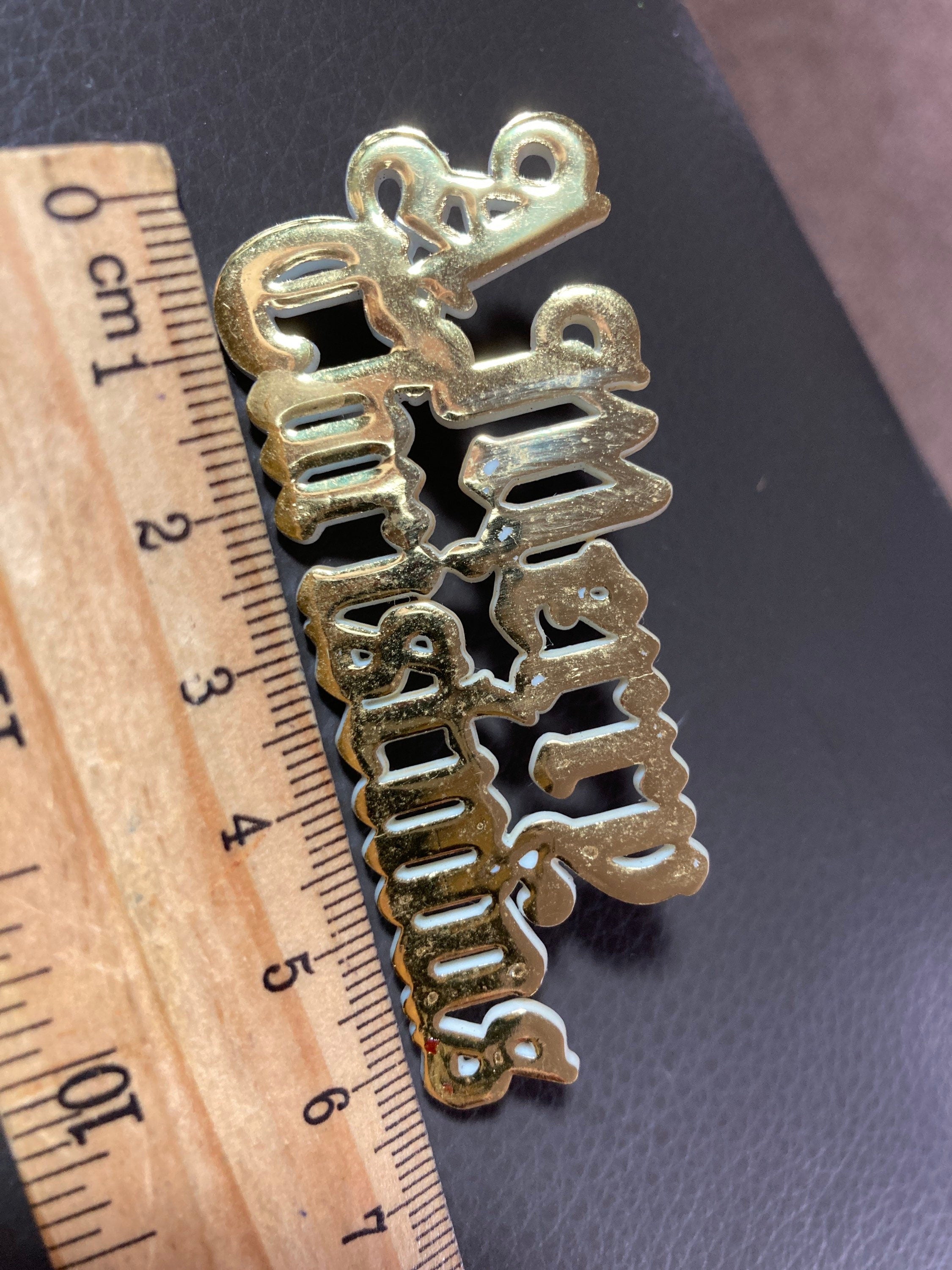 Vintage MERRY CHRISTMAS gold plastic stand up cake topper