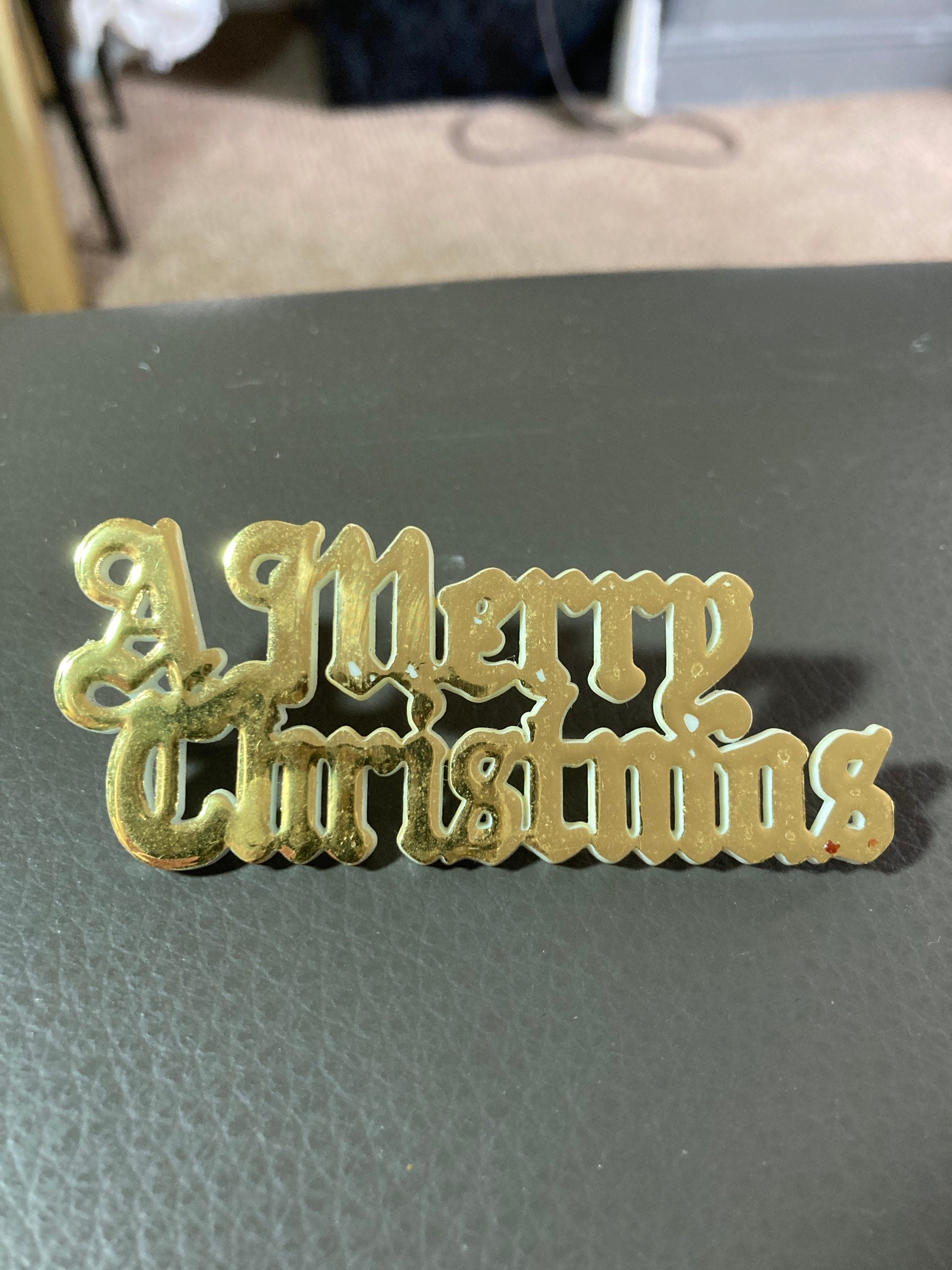 Vintage MERRY CHRISTMAS gold plastic stand up cake topper