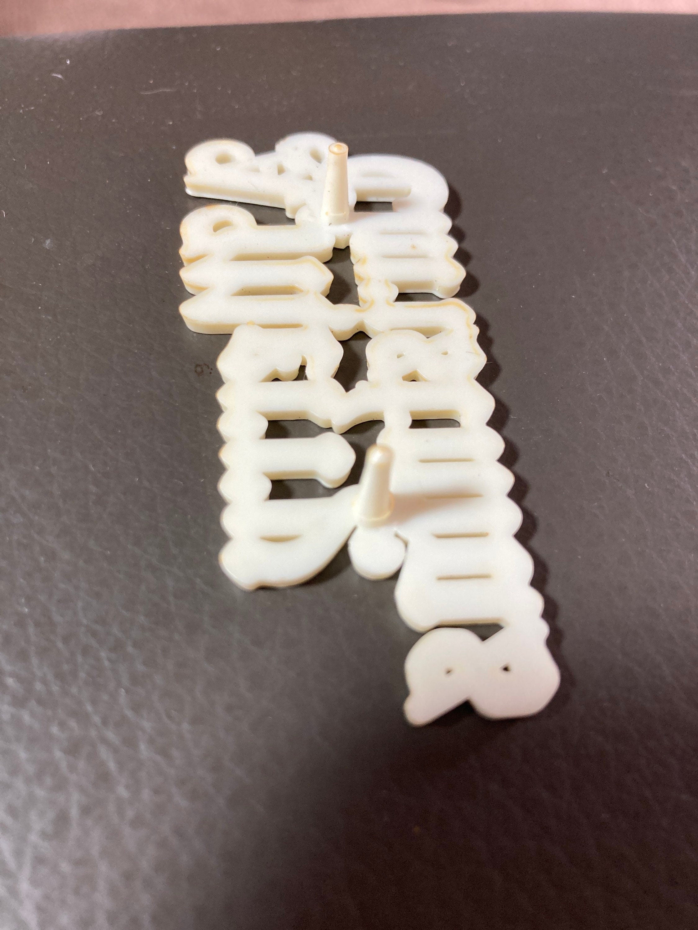 Vintage MERRY CHRISTMAS gold plastic stand up cake topper