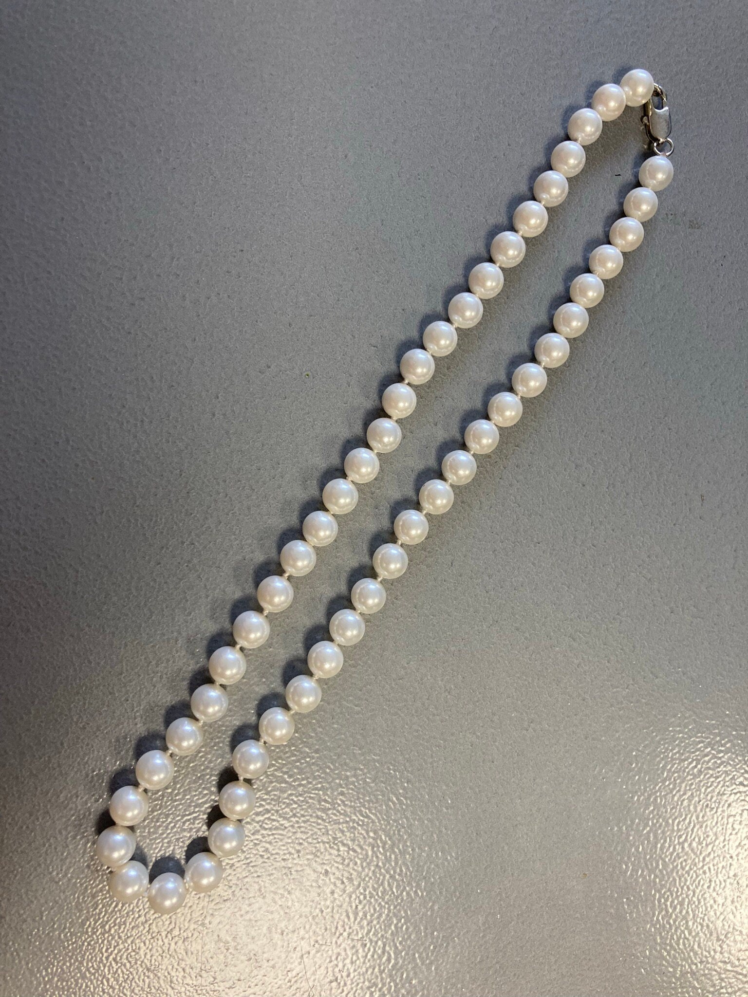 Modernist white knotted glass pearl necklace 46cm single strand of pearls