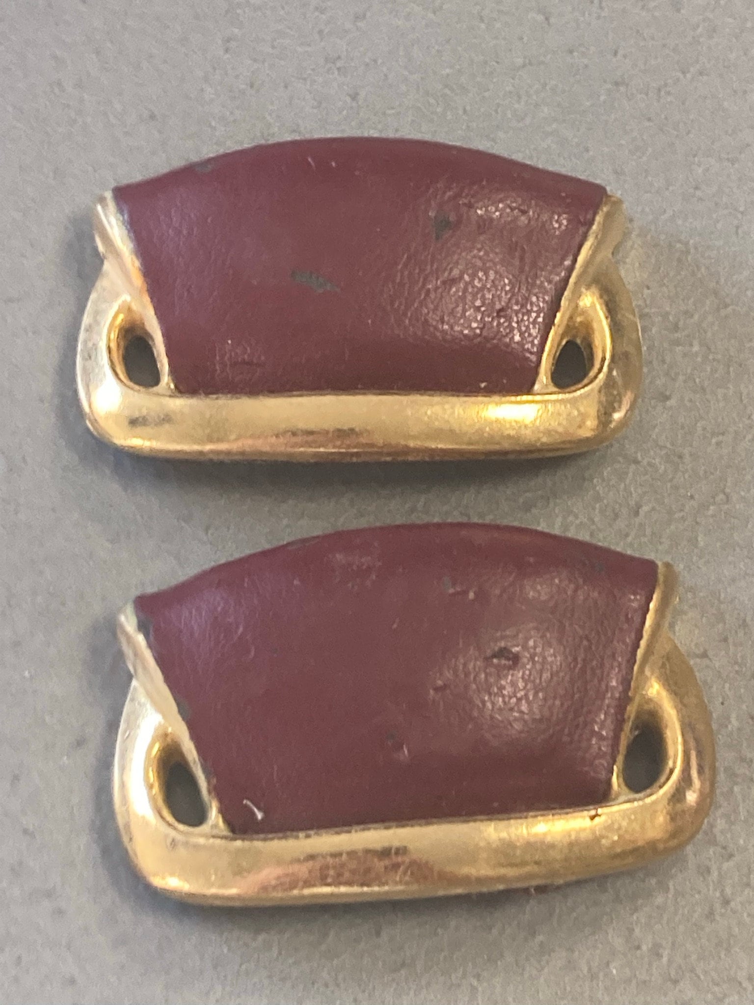 pair of Maroon Burgundy Oxblood red leather and gold tone shoe clips