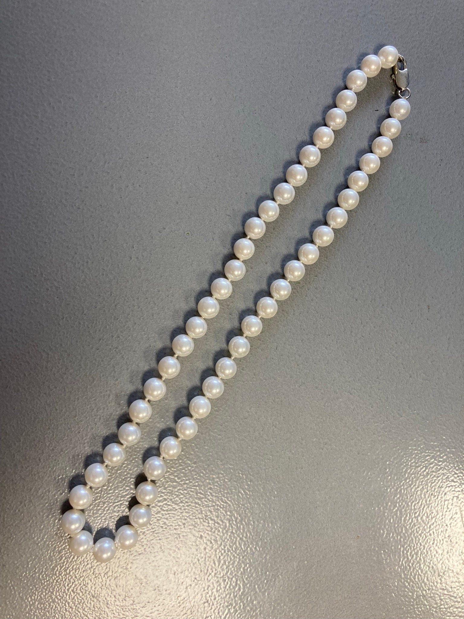 Modernist white knotted glass pearl necklace 46cm single strand of pearls
