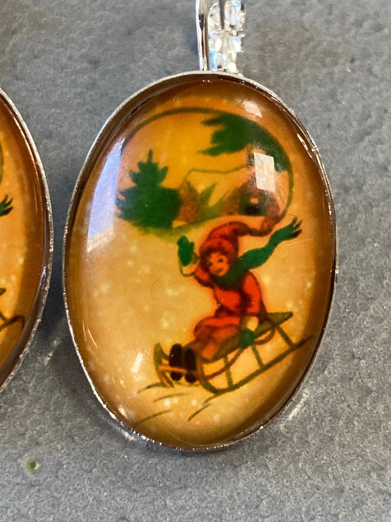 children on sledges pierced drop earrings ear wires