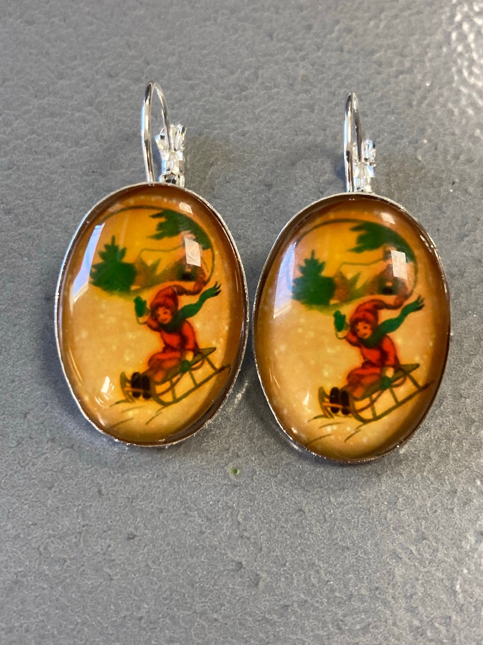 children on sledges pierced drop earrings ear wires