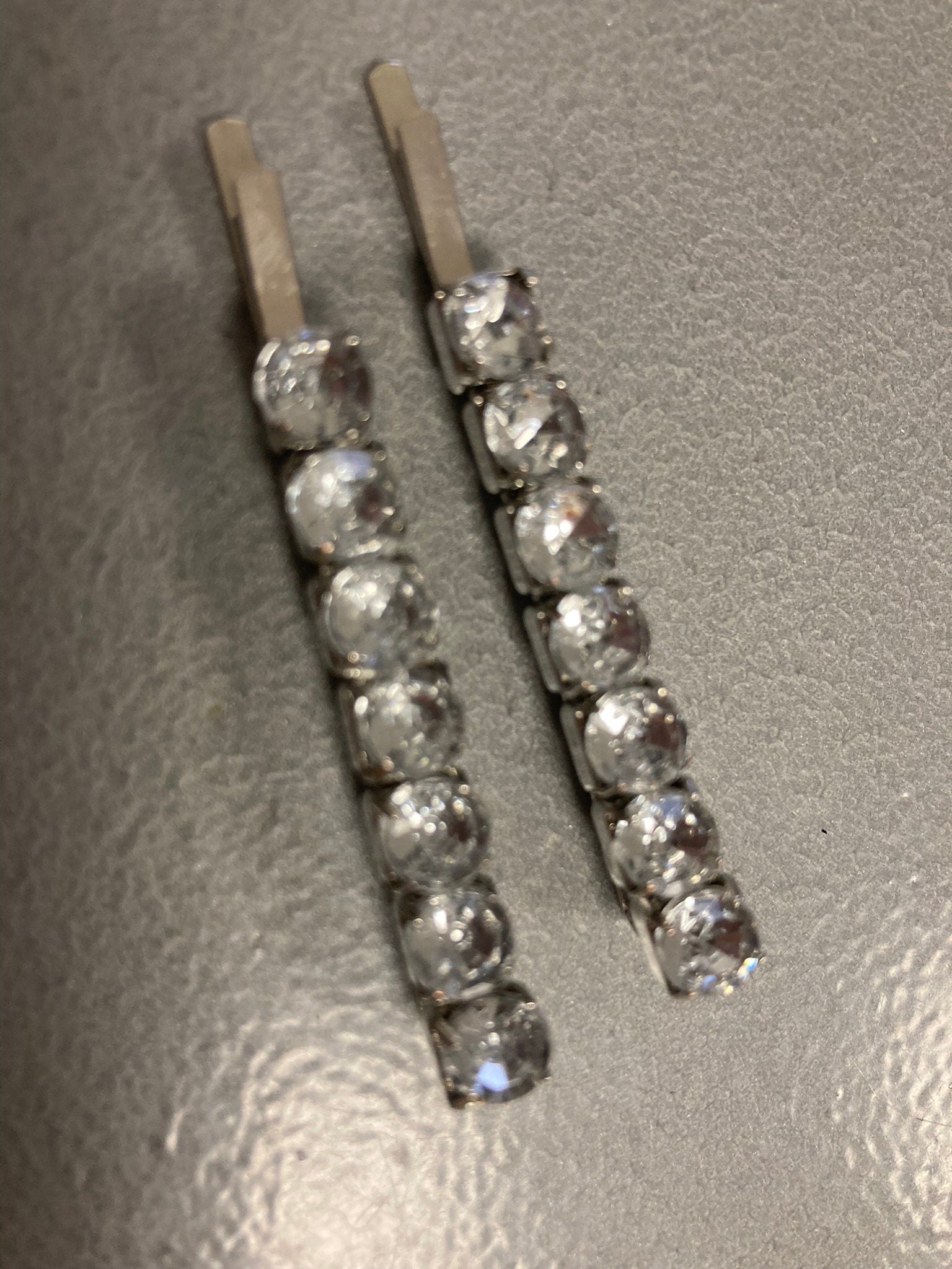 Vintage pair of clear diamanté silver tone rhinestone crystal hair slides