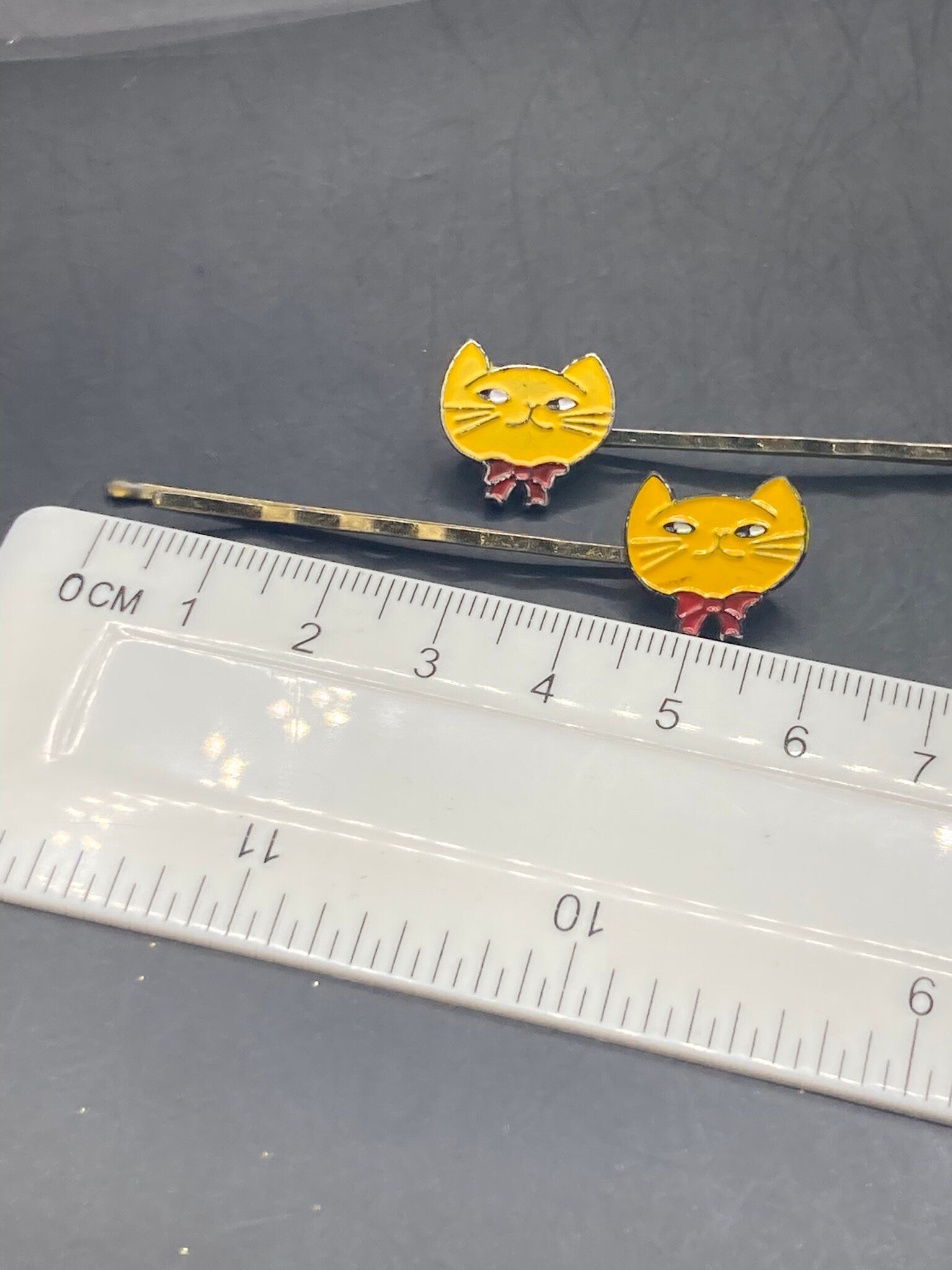 Pair yellow enamel cat girls hair slides