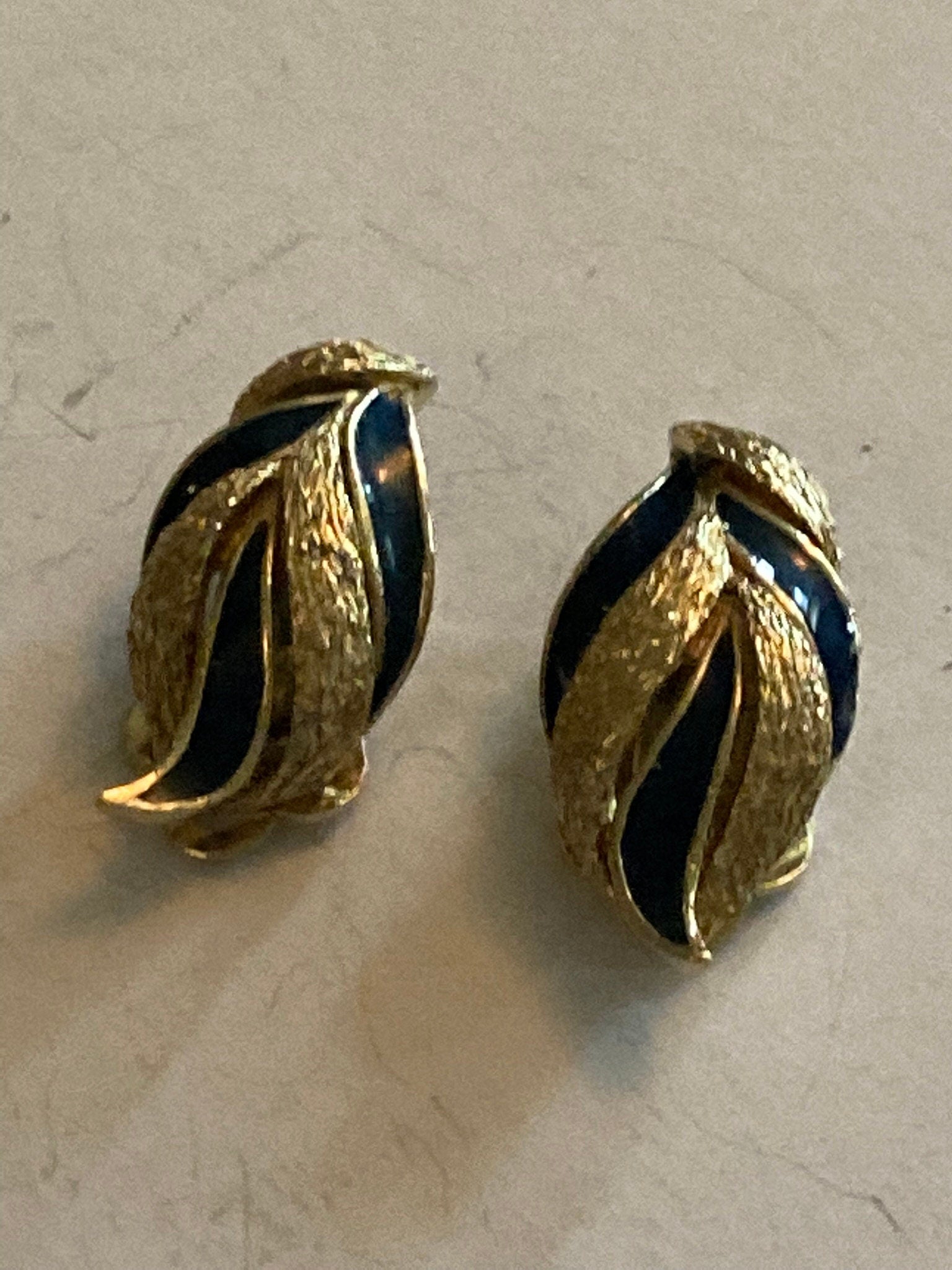 Signed A&S Attwood and Sawyer Vintage gold tone black enamel clip on earrings