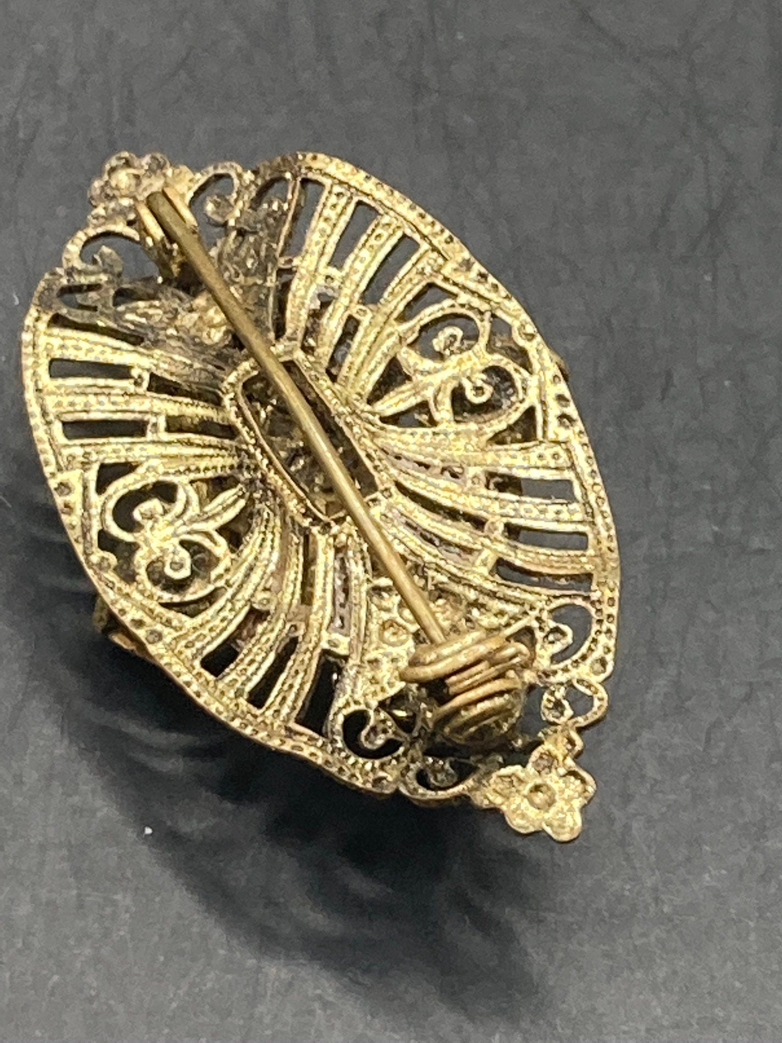 Czech gold tone filigree faux amethyst purple rhinestone brooch