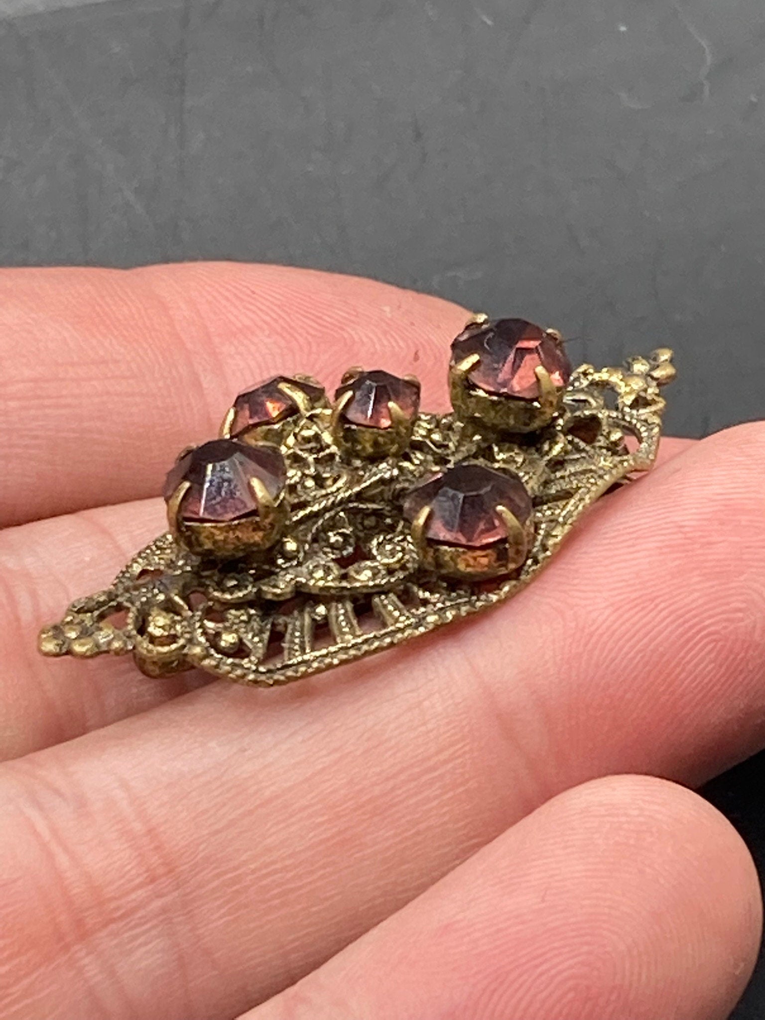 Czech gold tone filigree faux amethyst purple rhinestone brooch