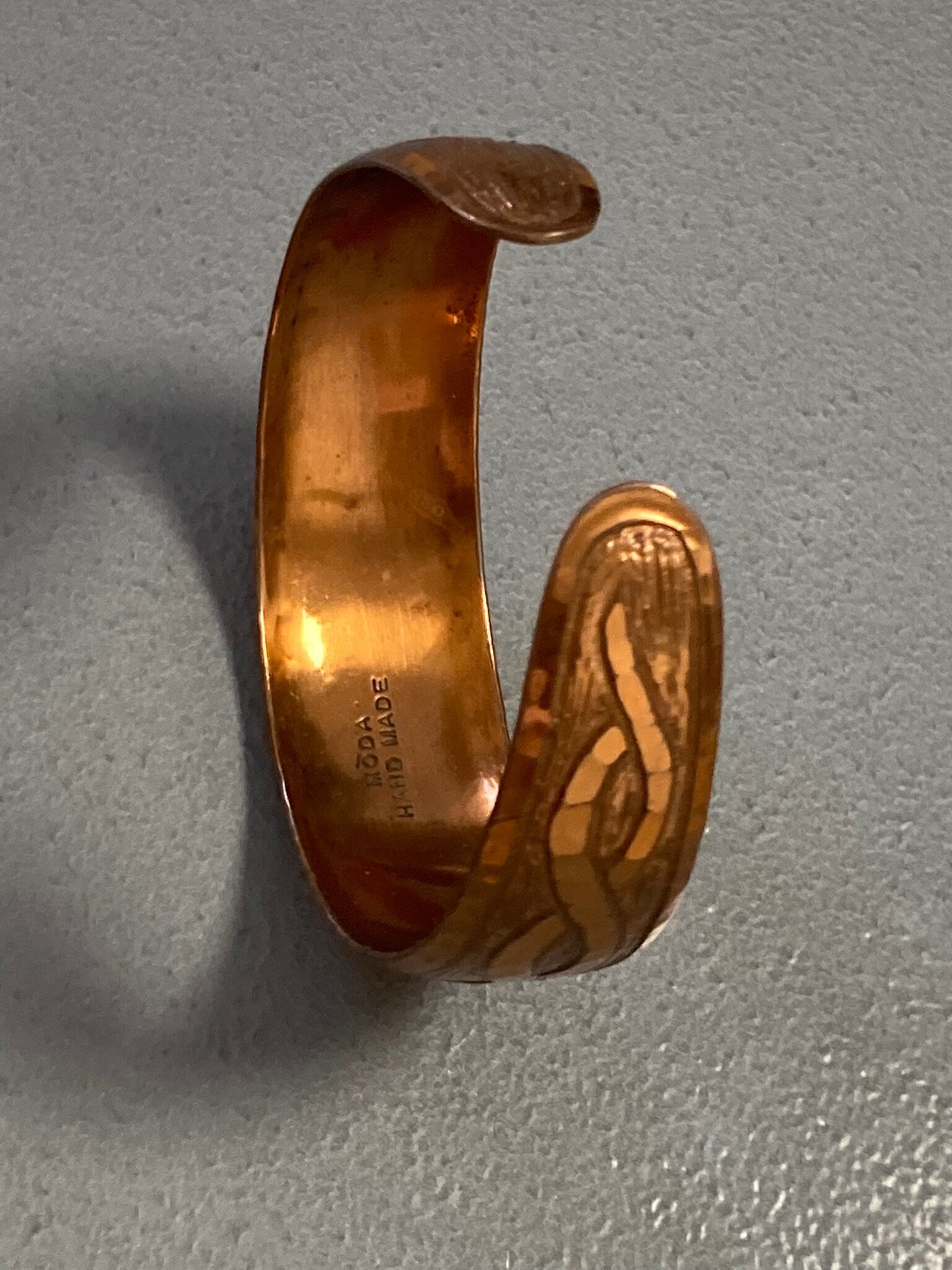 Signed MODA Maltese Brutalist copper tone etched metal bangle bracelet 1970s