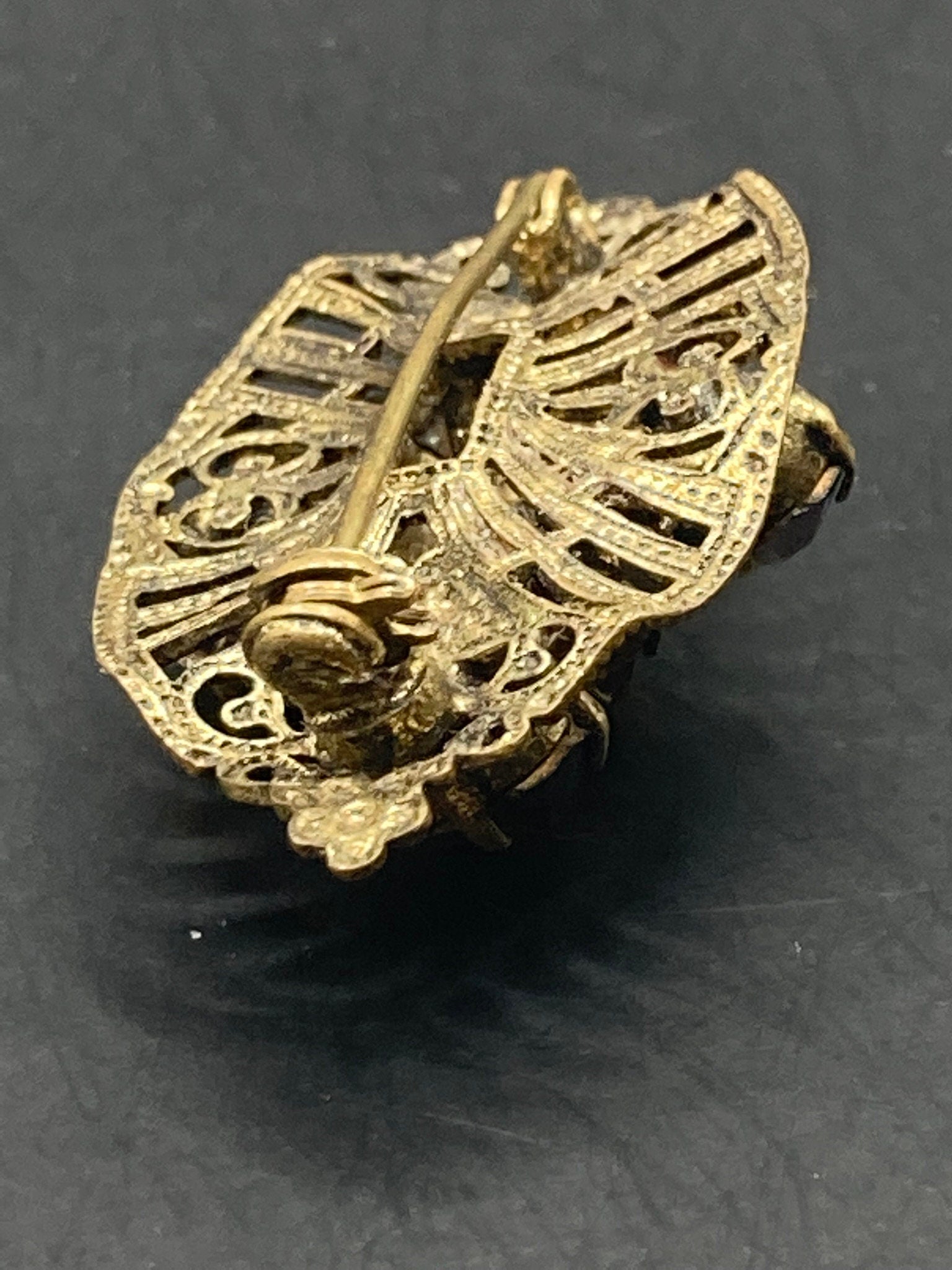 Czech gold tone filigree faux amethyst purple rhinestone brooch