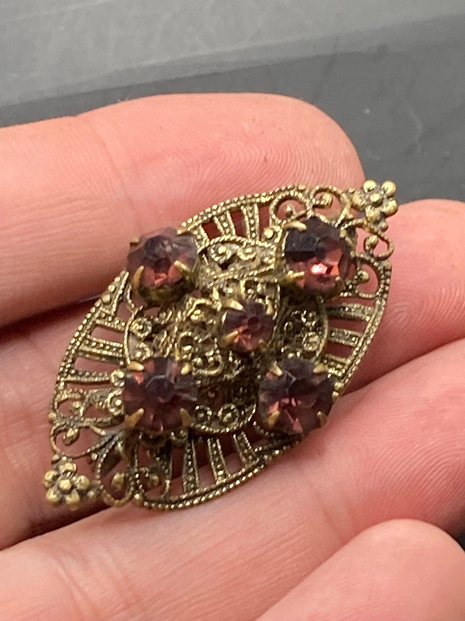 Czech gold tone filigree faux amethyst purple rhinestone brooch