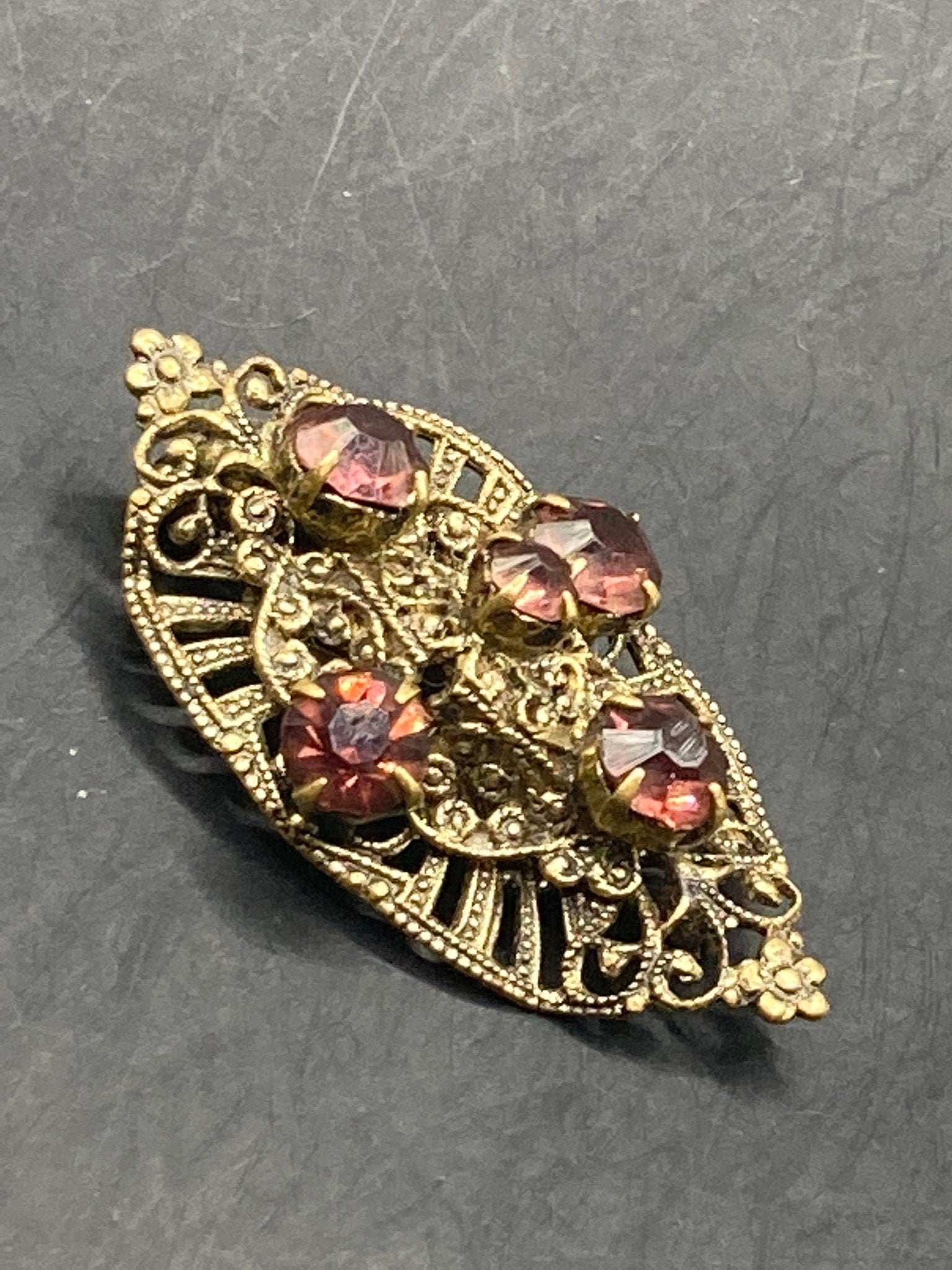 Czech gold tone filigree faux amethyst purple rhinestone brooch