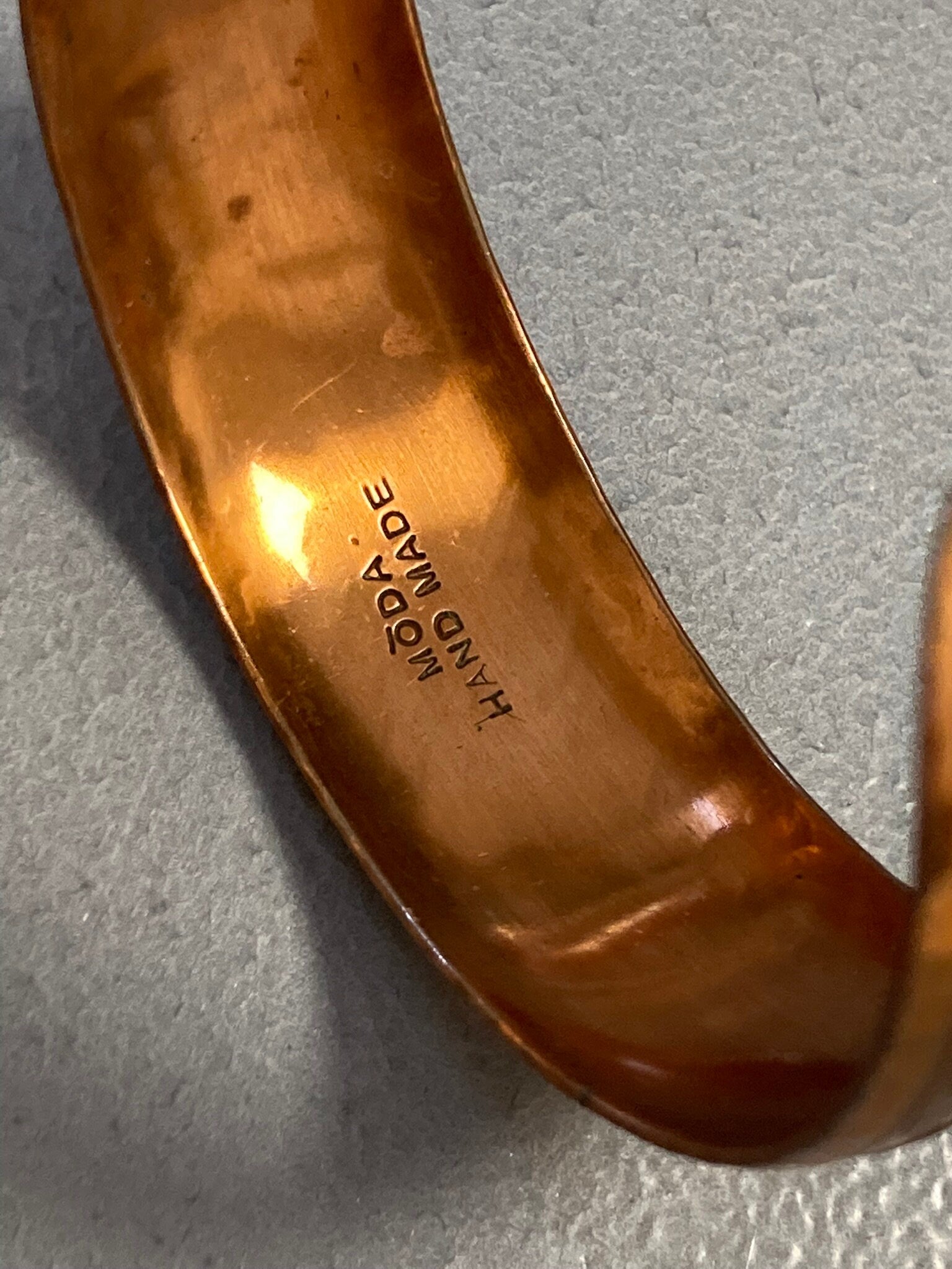 Signed MODA Maltese Brutalist copper tone etched metal bangle bracelet 1970s