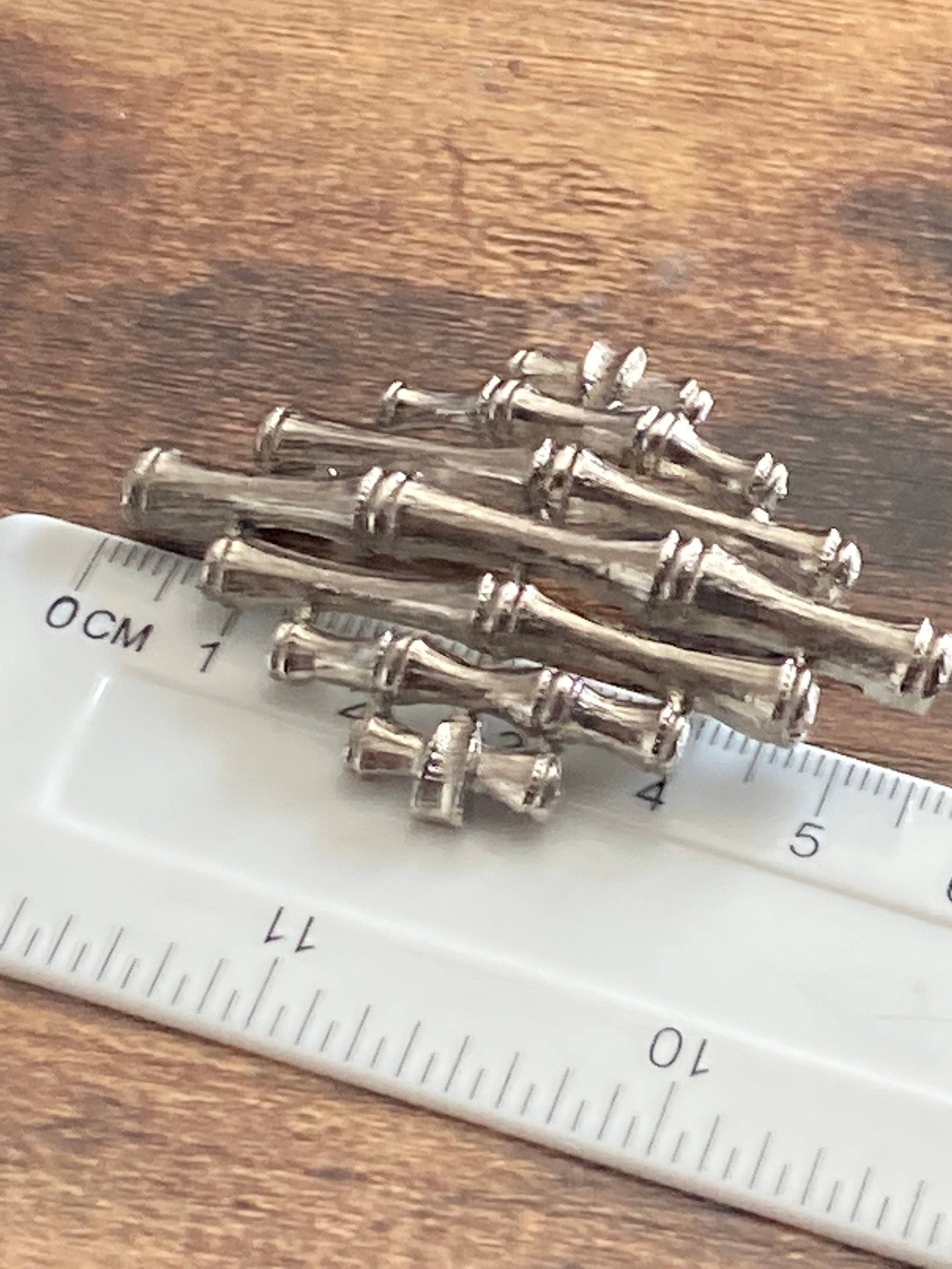 HOLLYWOOD signed bamboo brooch silver tone