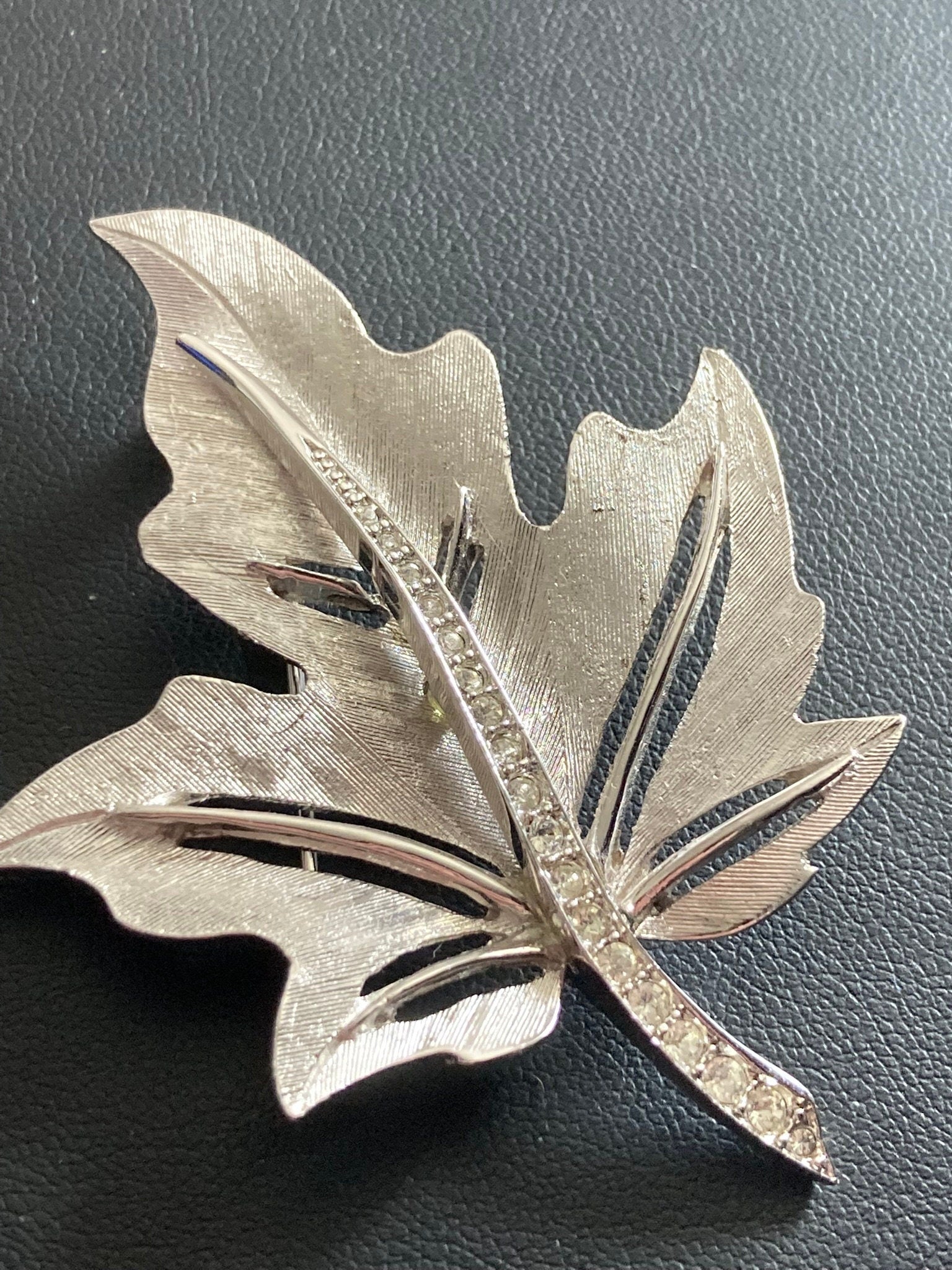 HOLLYWOOD signed silver diamanté paste maple leaf brooch