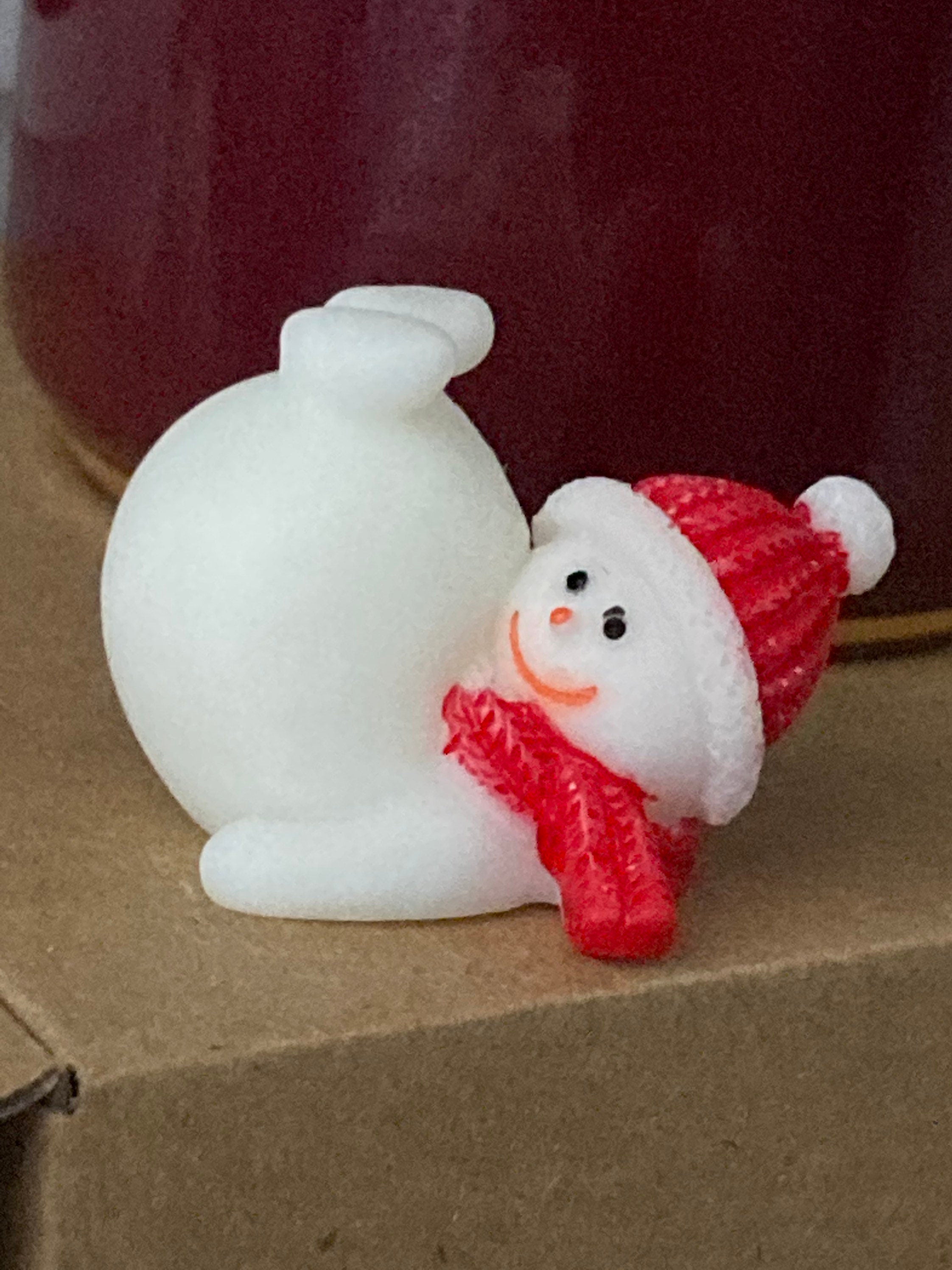 Cute tumbling snowman cake topper in plastic Christmas