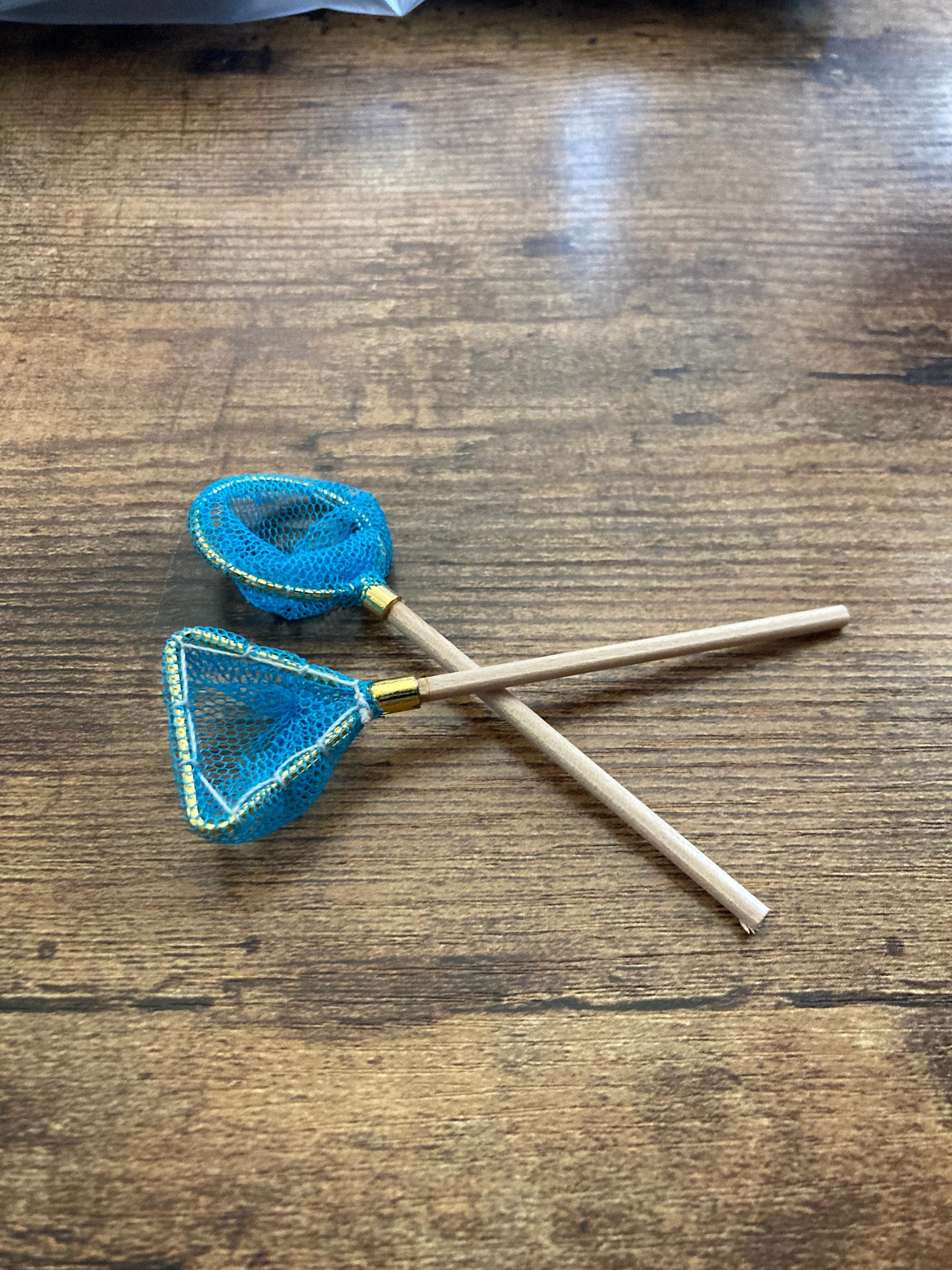 Pair of miniature fishing nets seaside cake topper decoration nautical