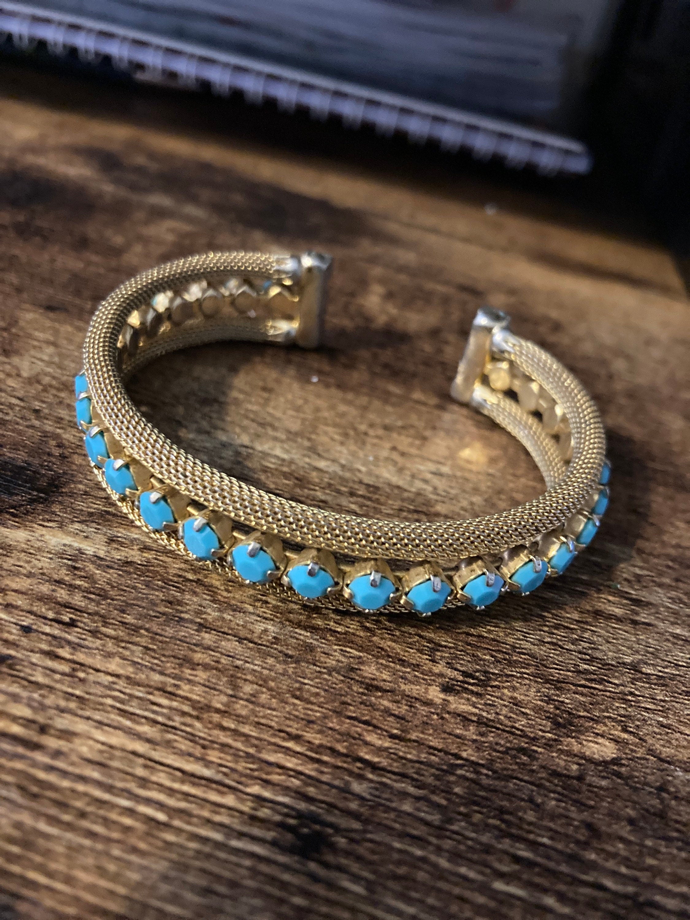 gold tone mesh cuff bracelet with turquoise blue paste
