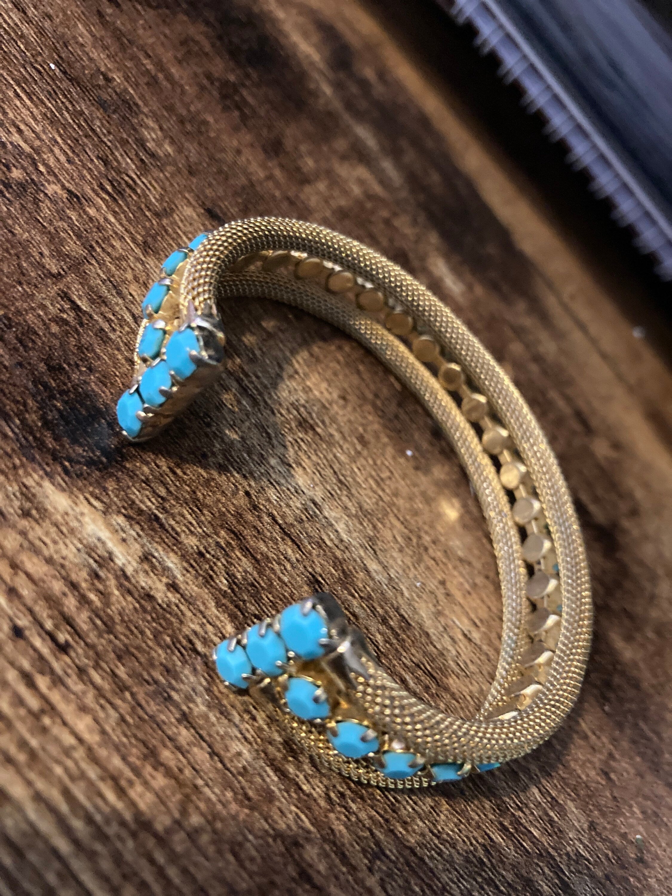 gold tone mesh cuff bracelet with turquoise blue paste