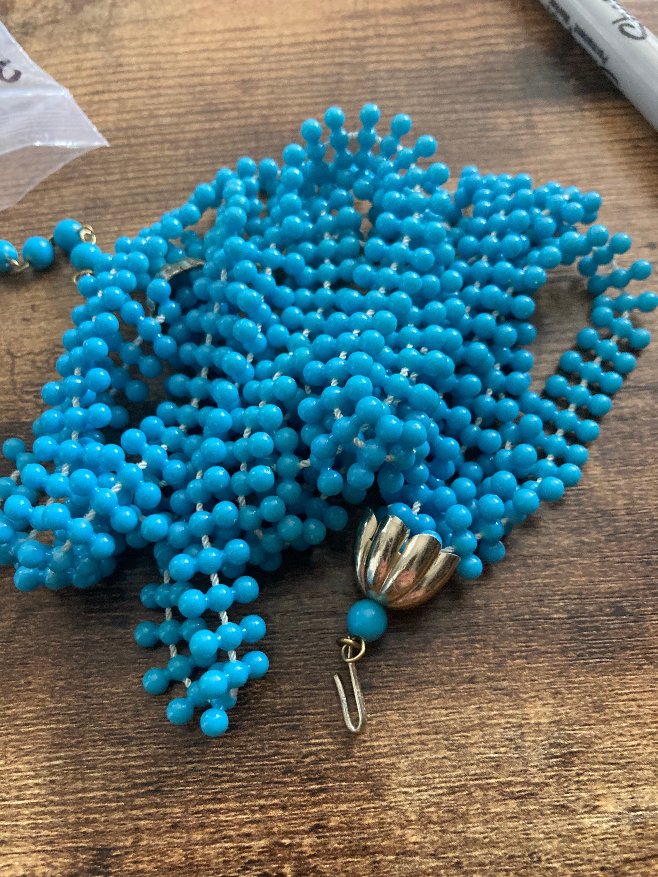 Vintage multi strand bright turquoise plastic fixed beaded necklace