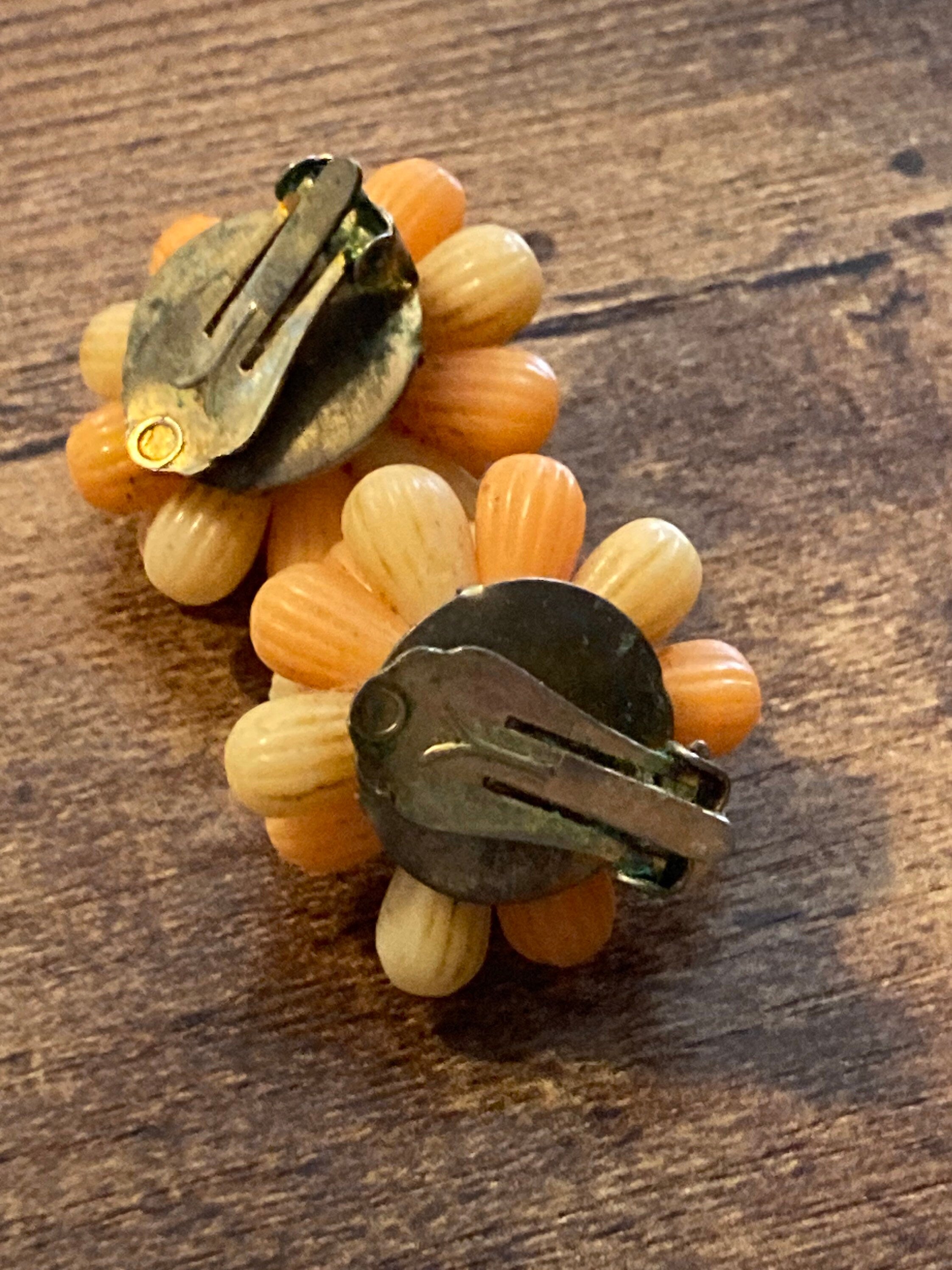 Vintage 1950s bright tangerine orange floral plastic beaded Cluster Clip On Earrings