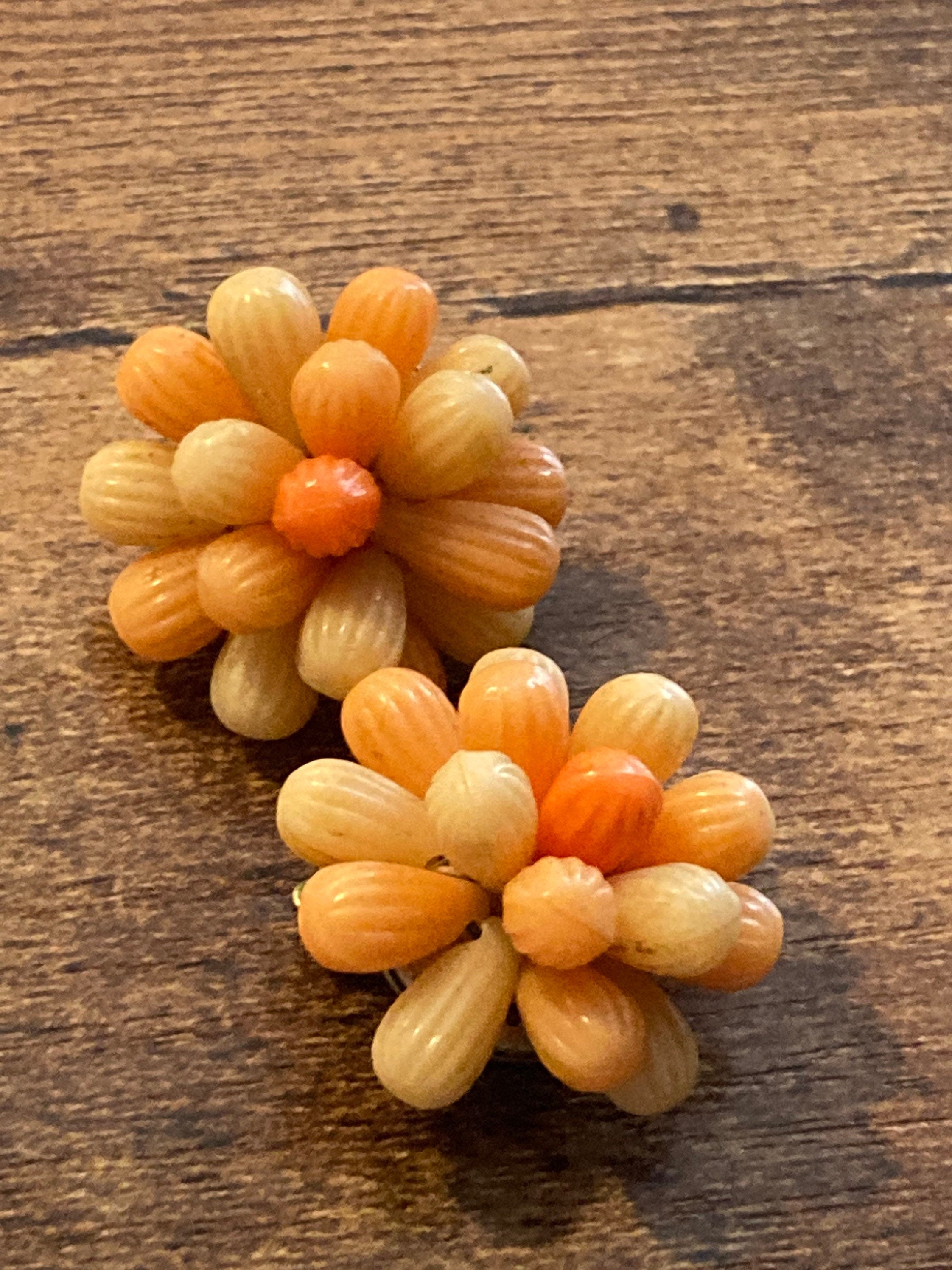 Vintage 1950s bright tangerine orange floral plastic beaded Cluster Clip On Earrings