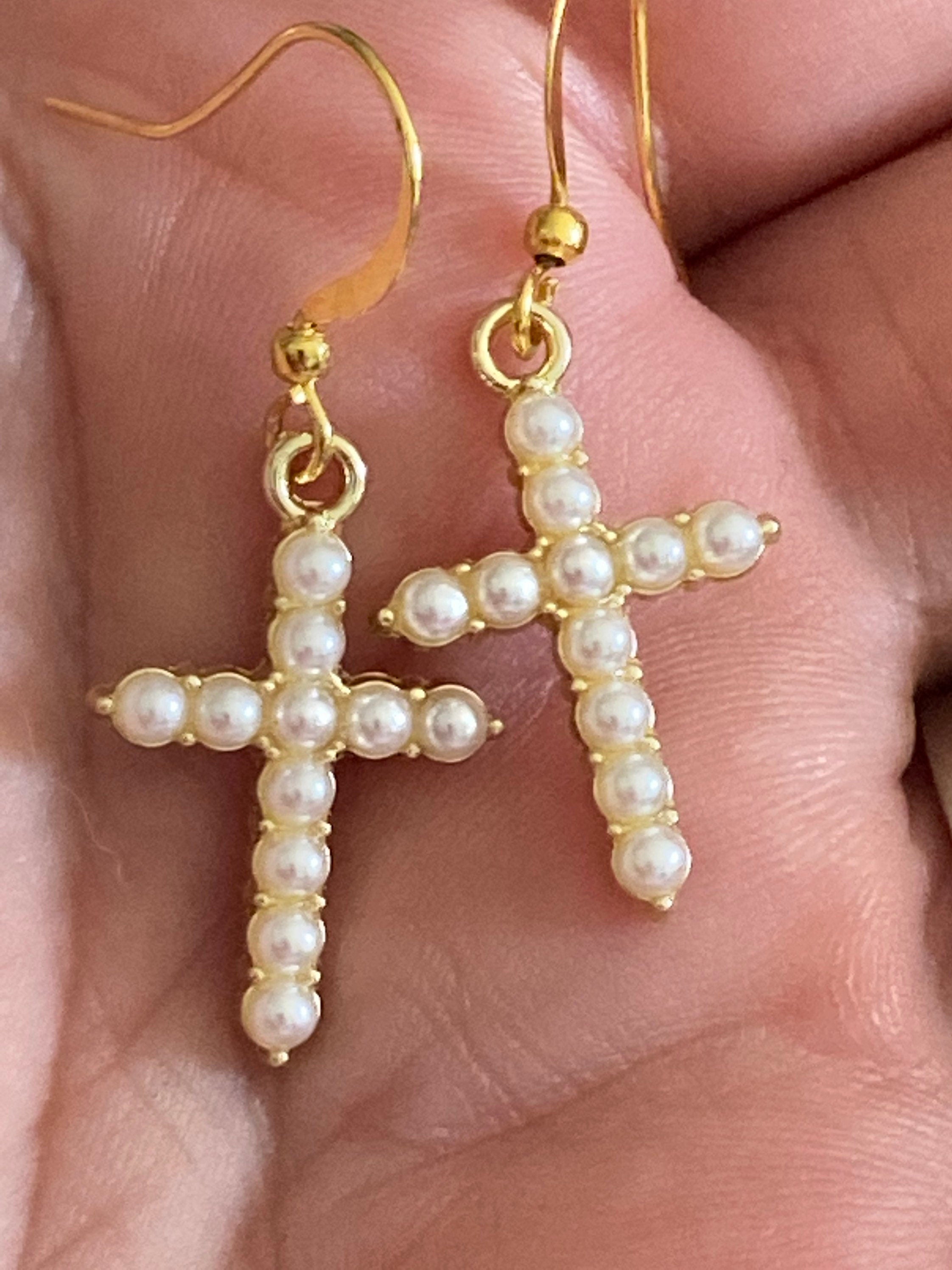Handmade gold tone white seed Pearl cross drop earrings