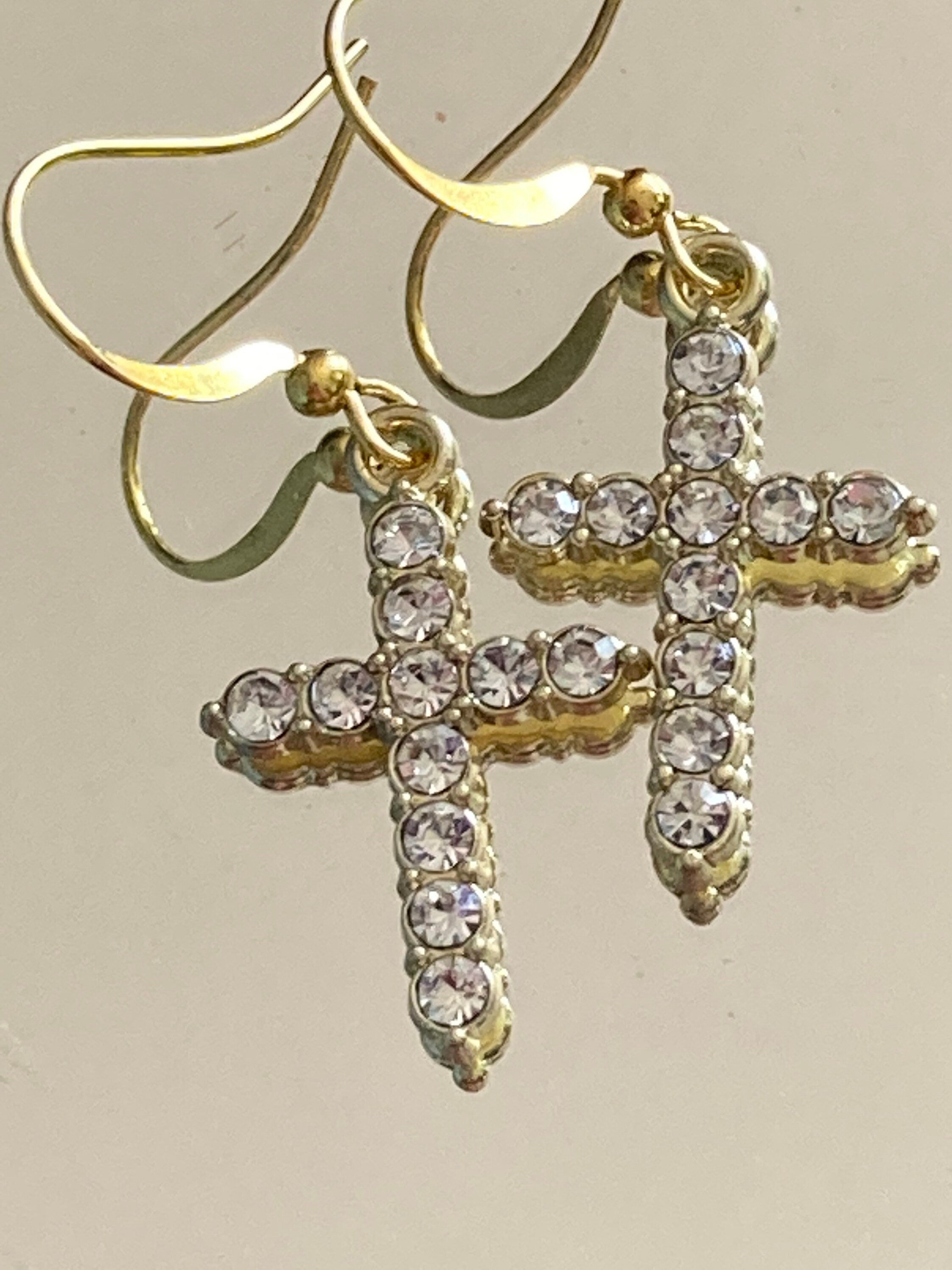 Handmade gold tone white seed Pearl cross drop earrings