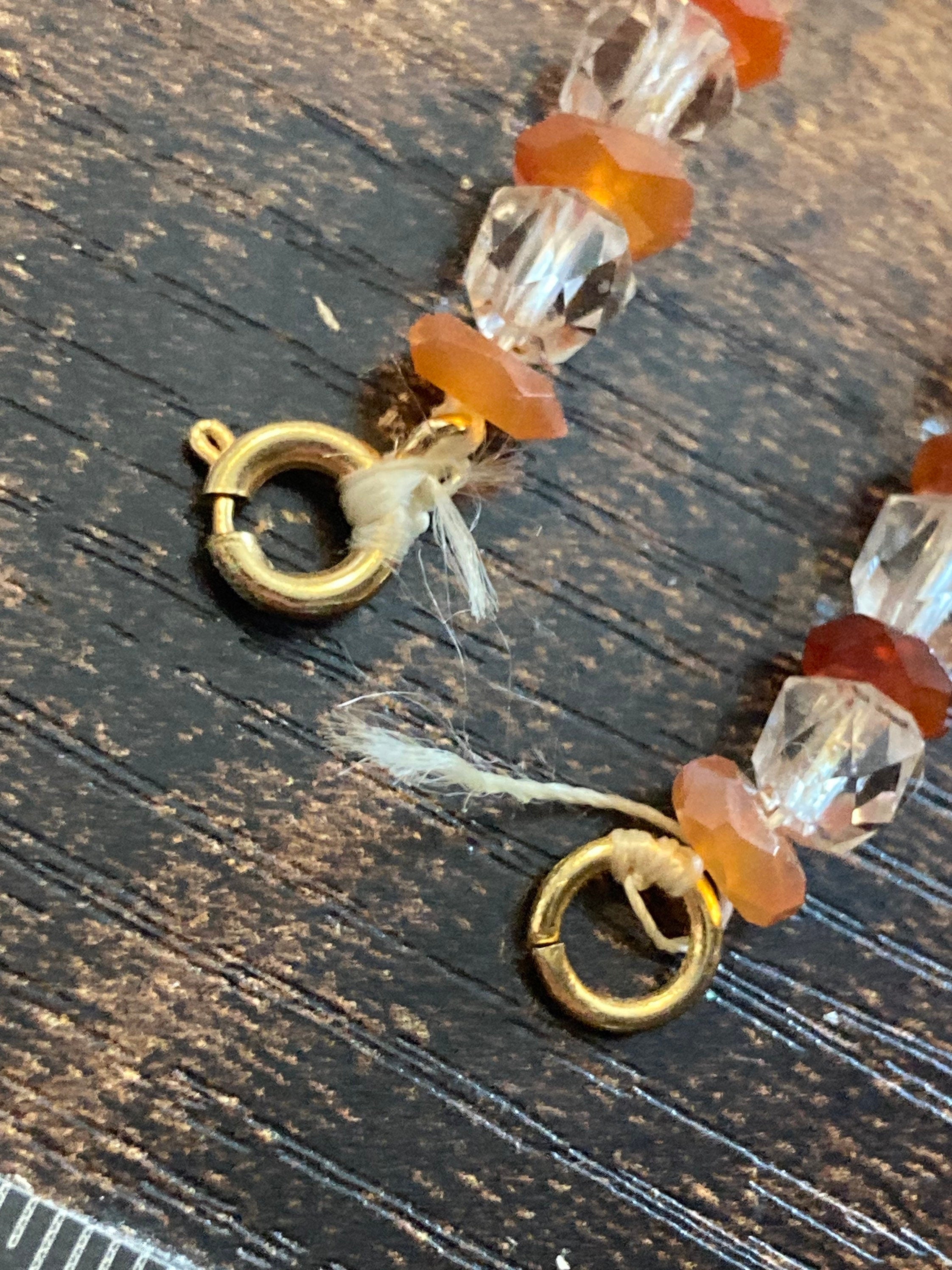 Art Deco 1920s clear orange beaded glass necklace in need of restringing 42cm