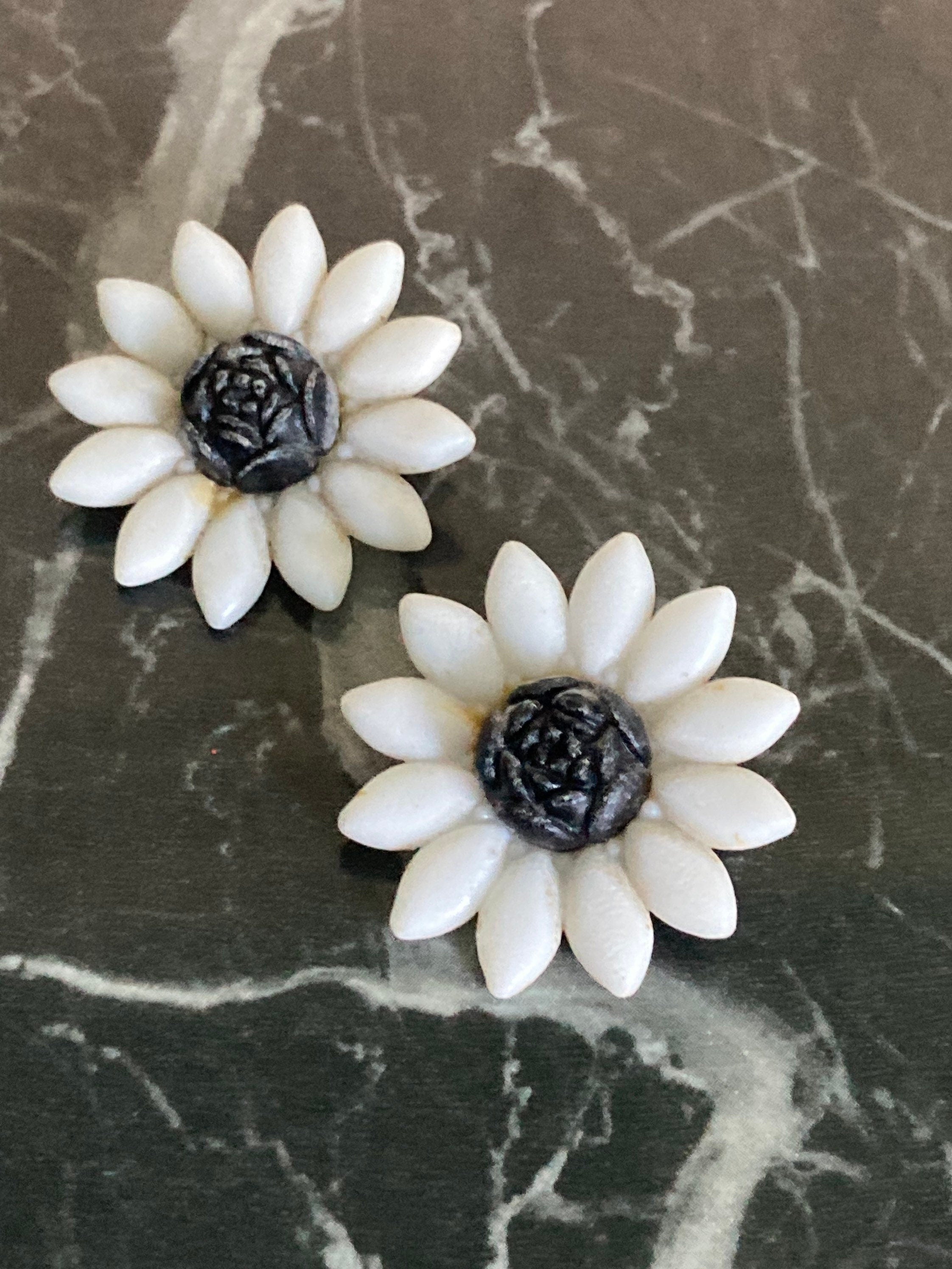 MCM white early plastic celluloid floral daisy stud clip on earrings