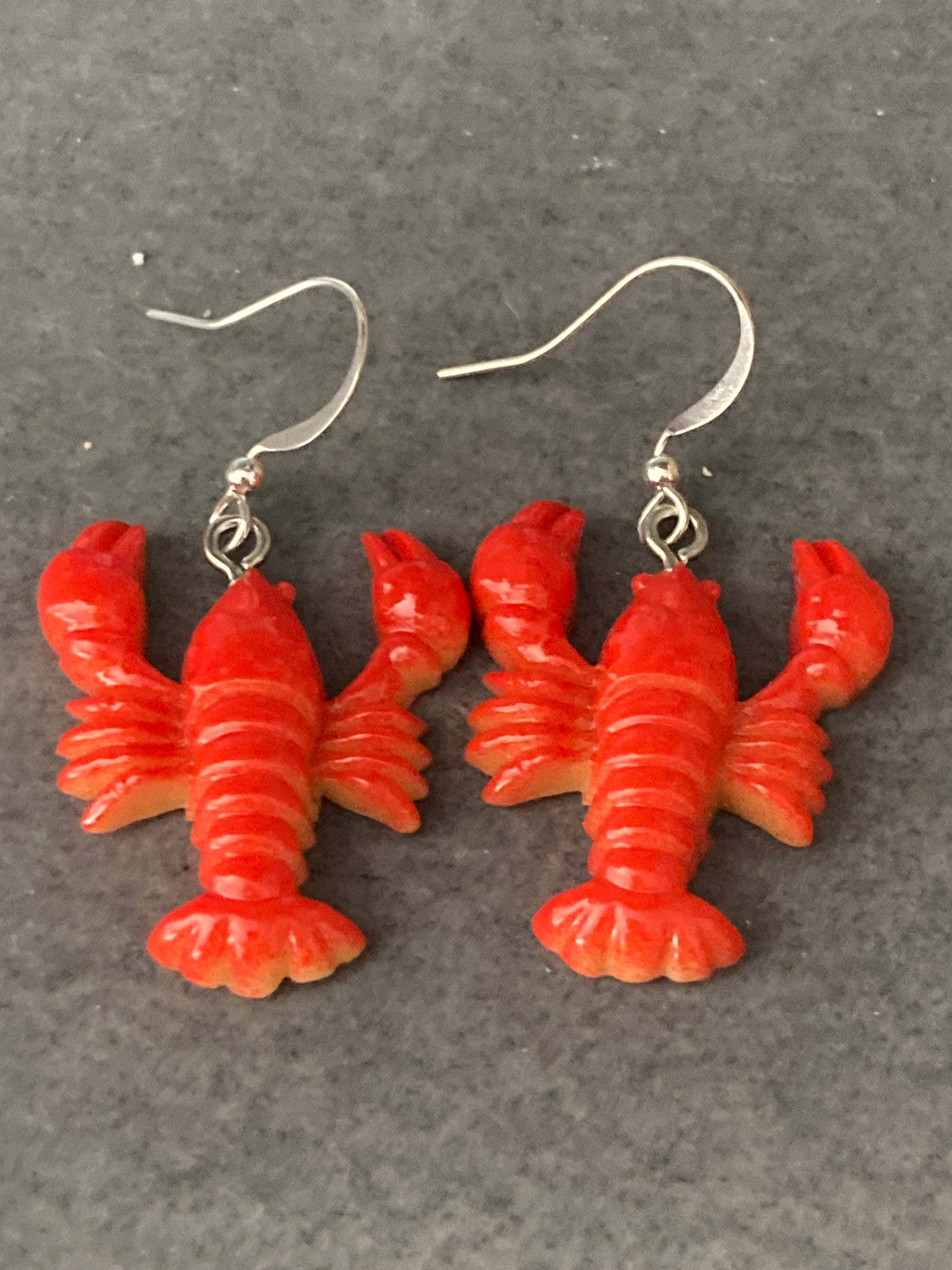 Orange plastic nautical lobster dangly earrings pierced ears
