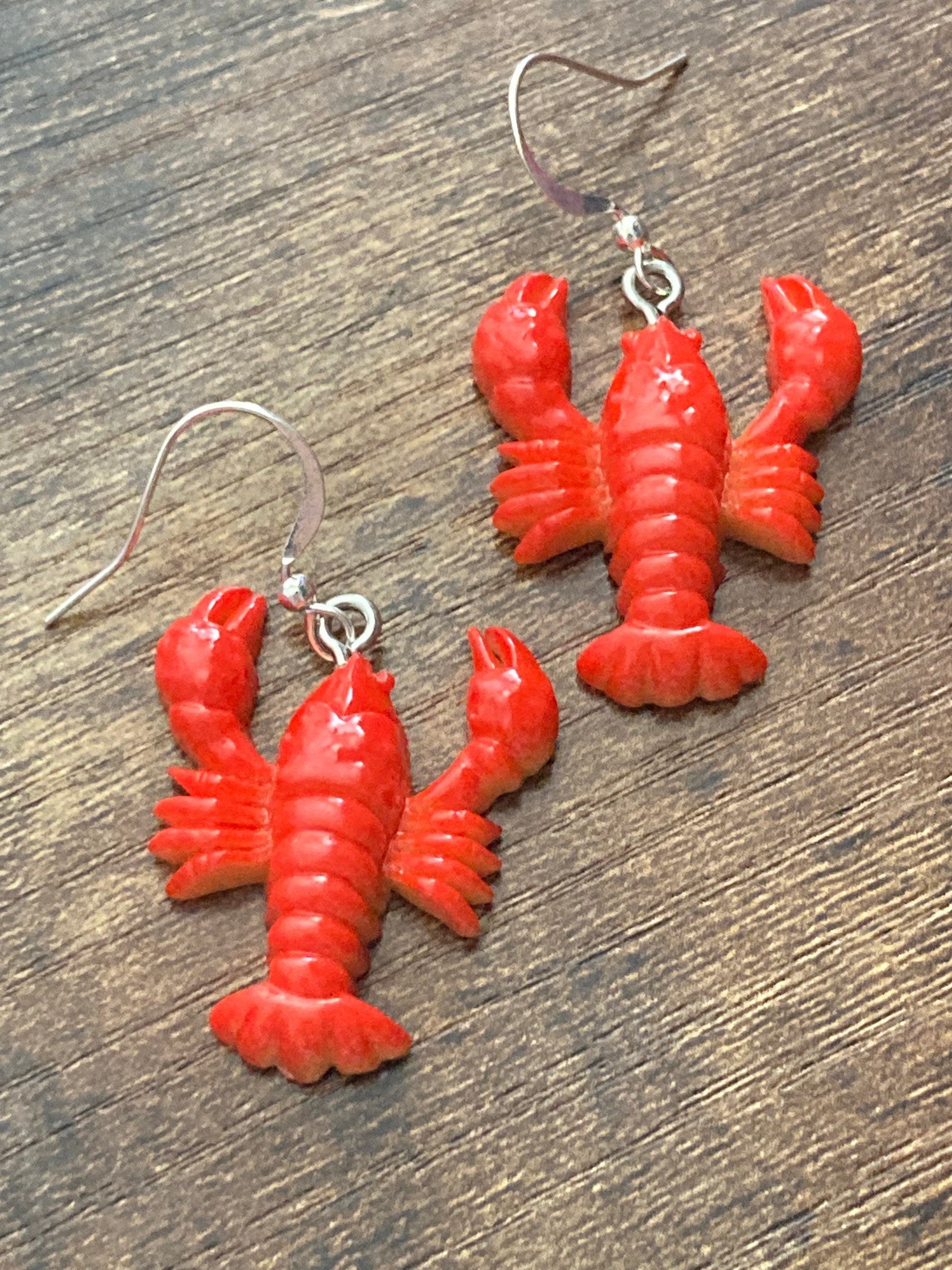 Orange plastic nautical lobster dangly earrings pierced ears