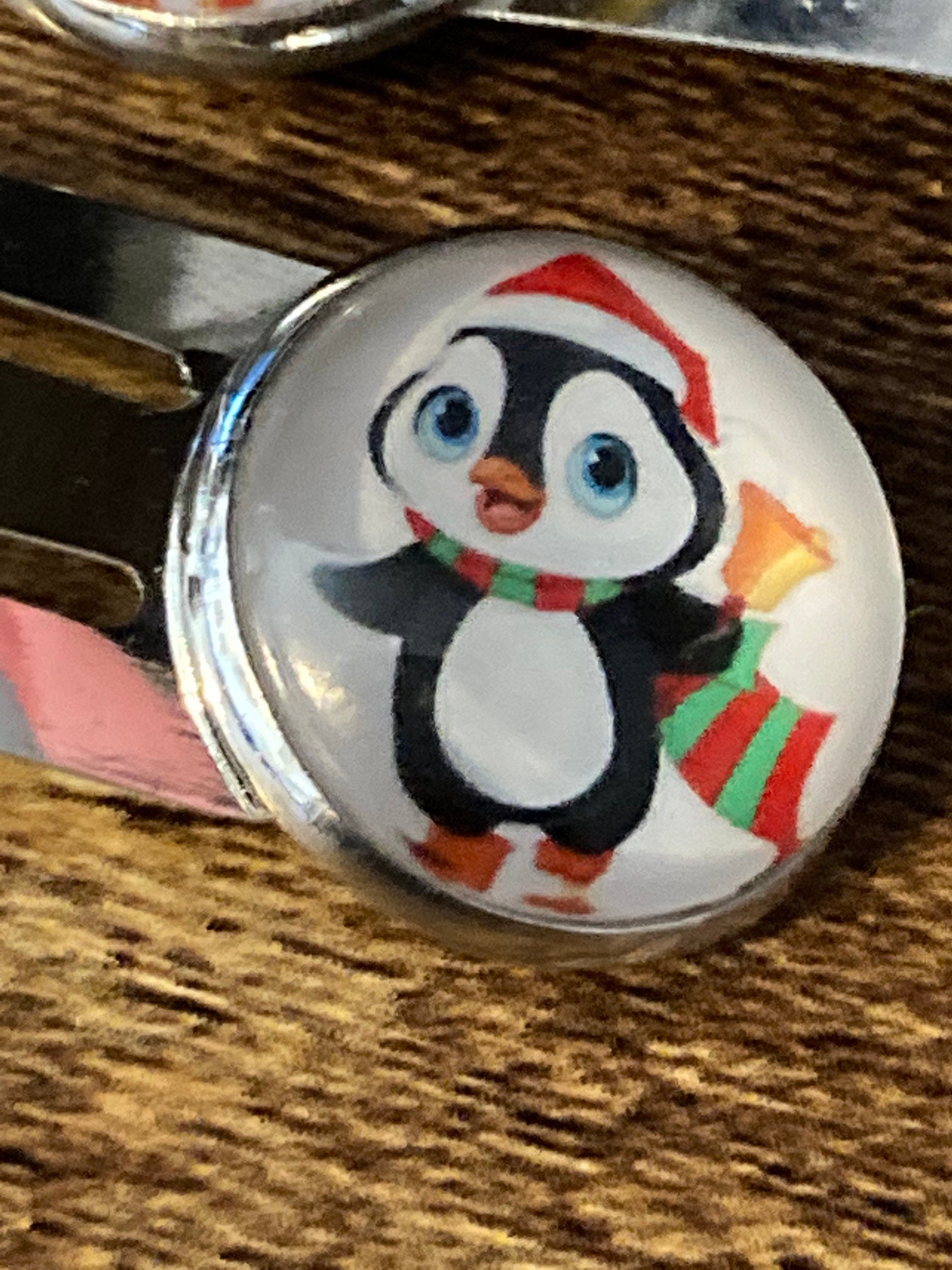 Pair of silver Christmas penguins hair slides