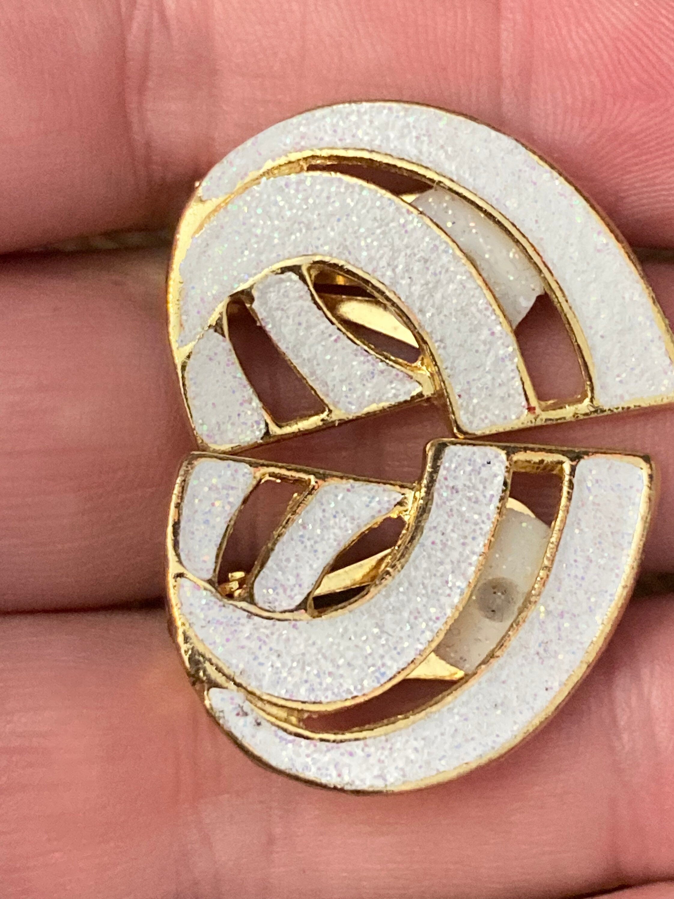 Vintage 1980s large gold tone abstract white glitter clip on earrings