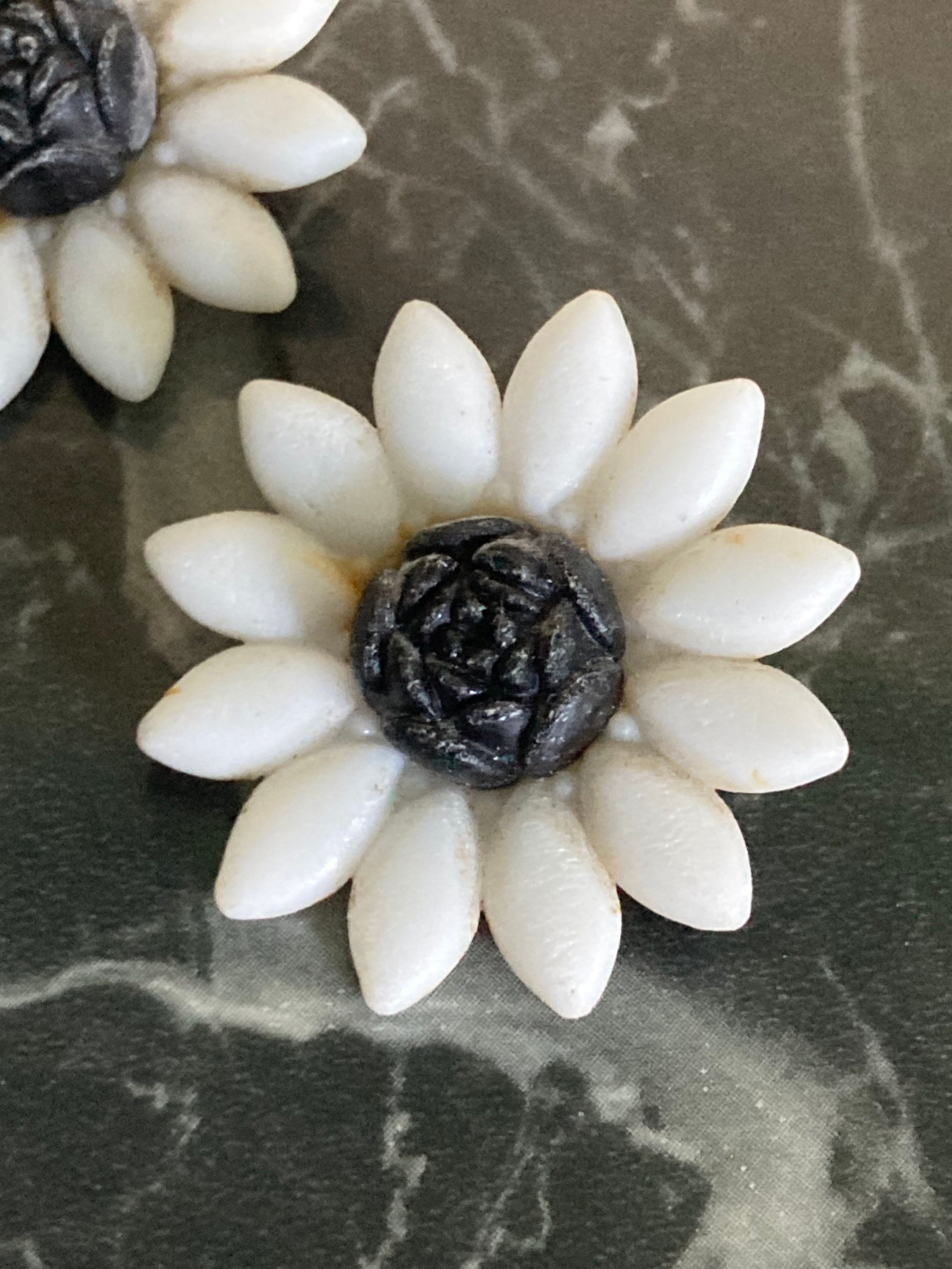 MCM white early plastic celluloid floral daisy stud clip on earrings