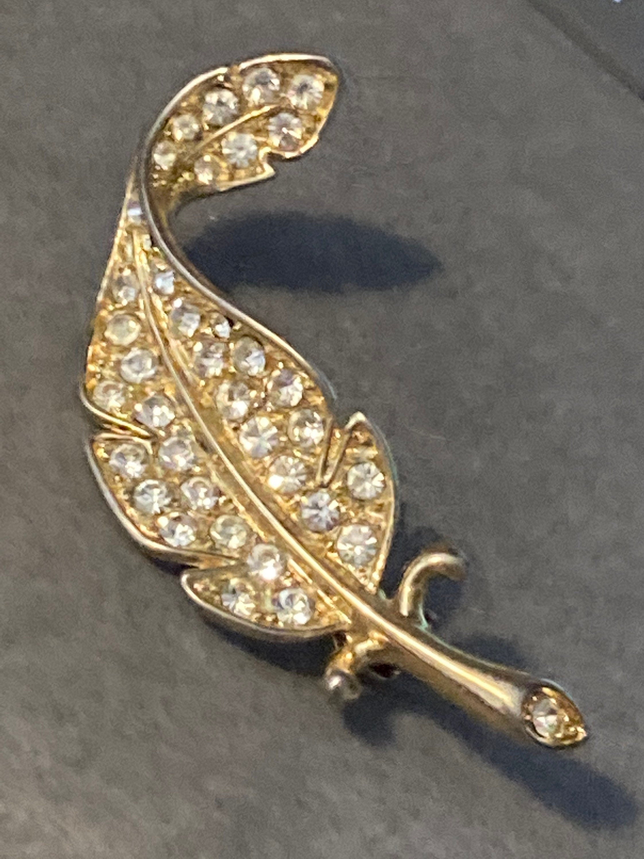 BJ signed clear rhinestone leaf brooch gold tone 1970s 1960s
