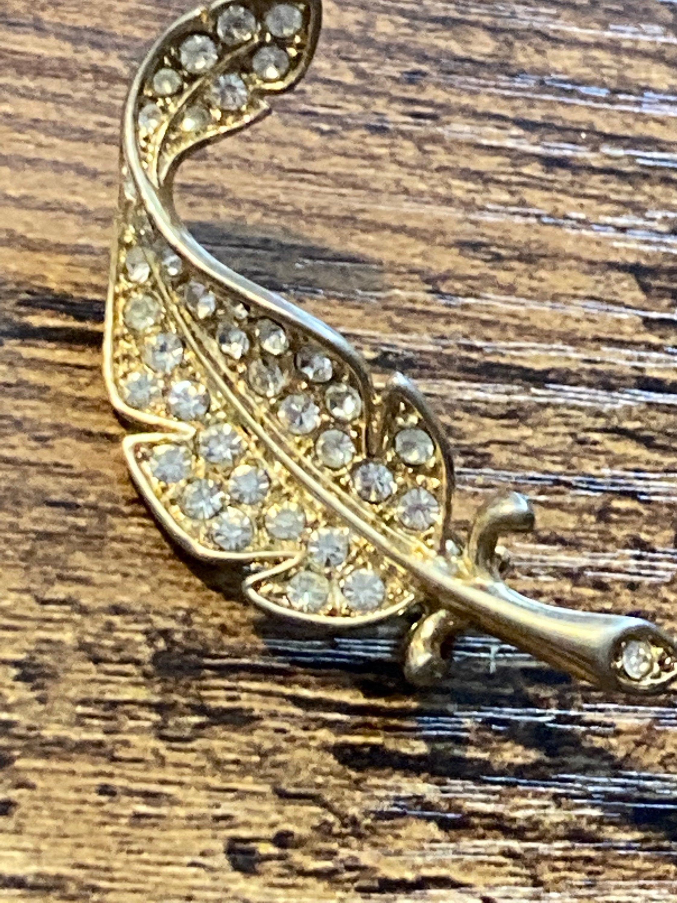 BJ signed clear rhinestone leaf brooch gold tone 1970s 1960s