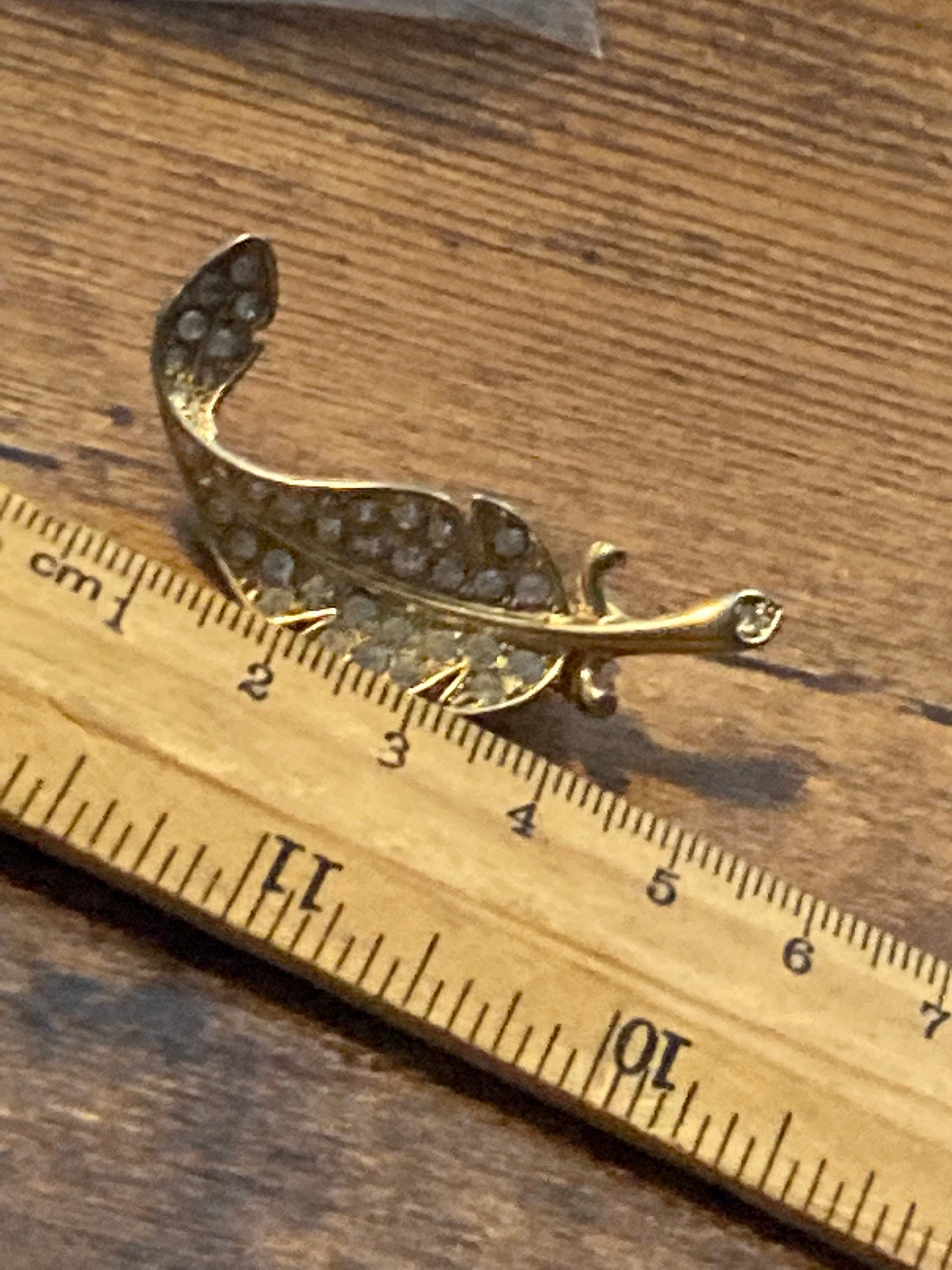 BJ signed clear rhinestone leaf brooch gold tone 1970s 1960s