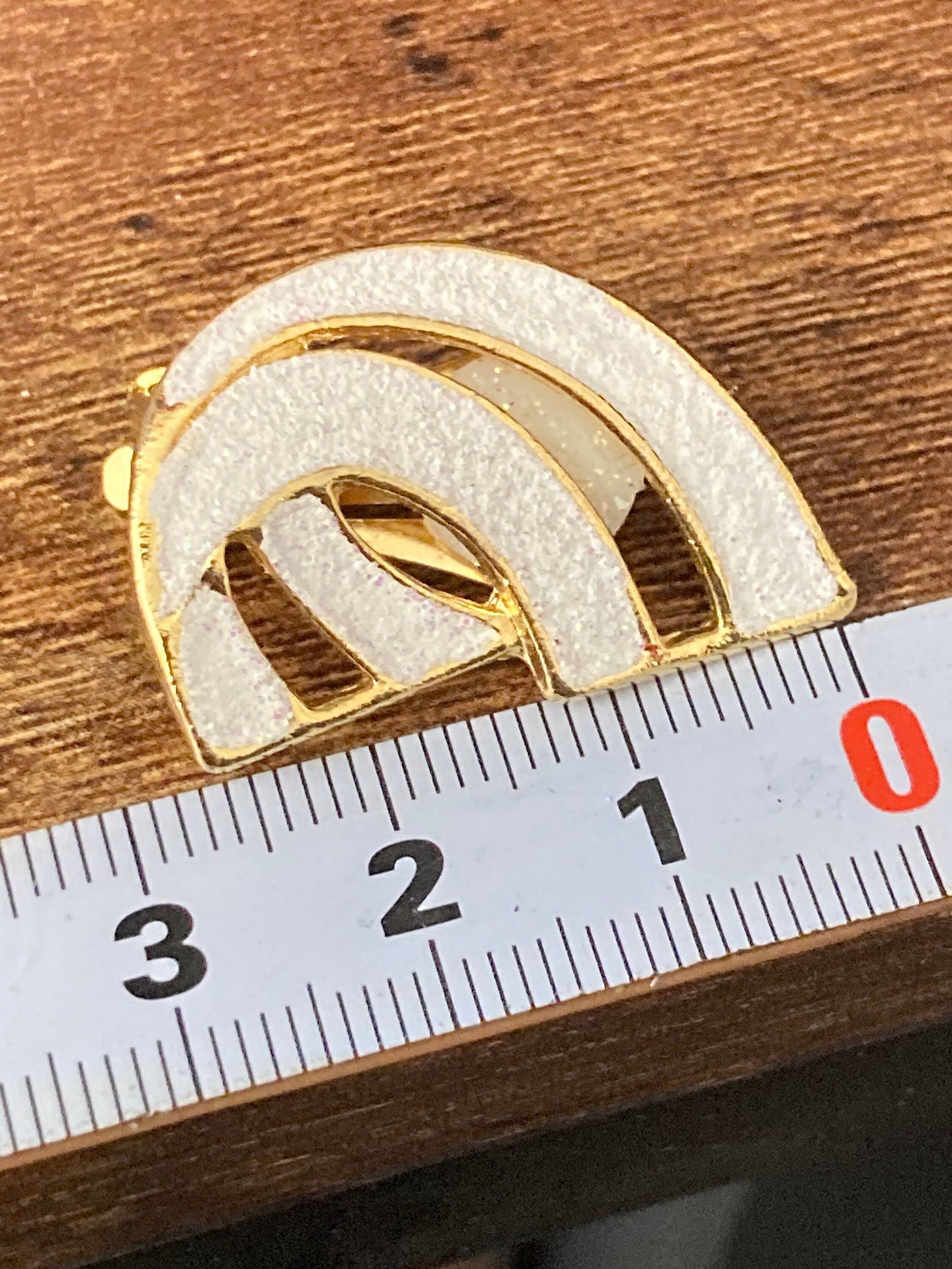 Vintage 1980s large gold tone abstract white glitter clip on earrings
